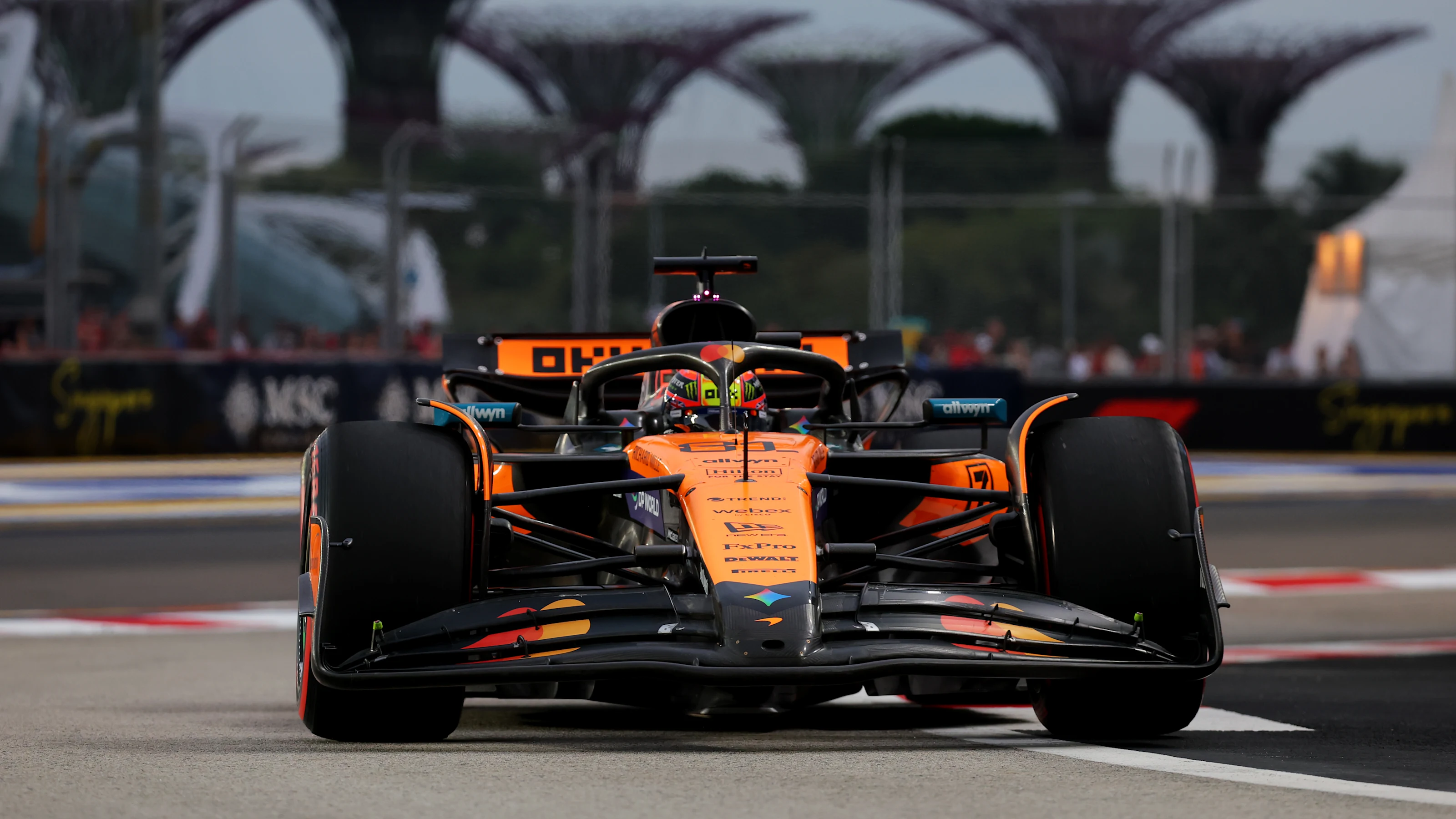 SINGAPORE, SINGAPORE - OCTOBER 04: Oscar Piastri of Australia driving the (81) McLaren MCL39