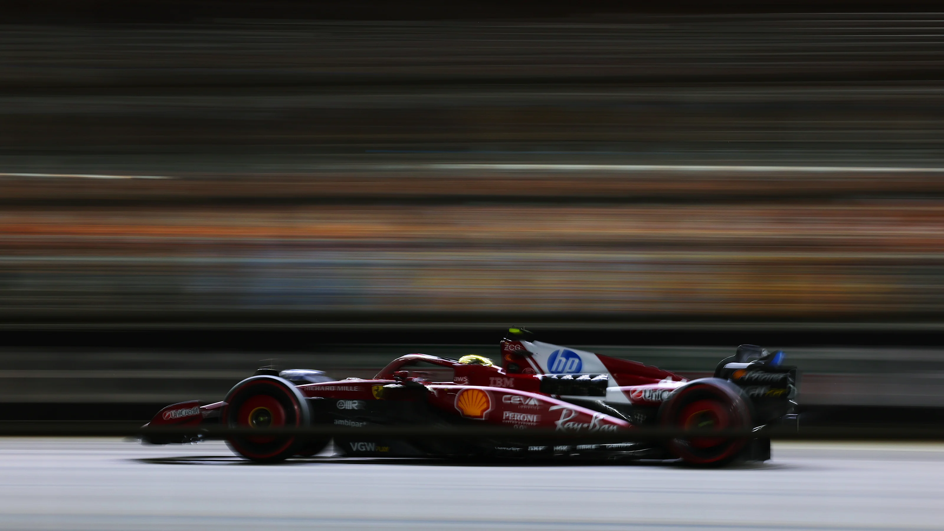 SINGAPORE, SINGAPORE - OCTOBER 04: Lewis Hamilton of Great Britain driving the (44) Scuderia