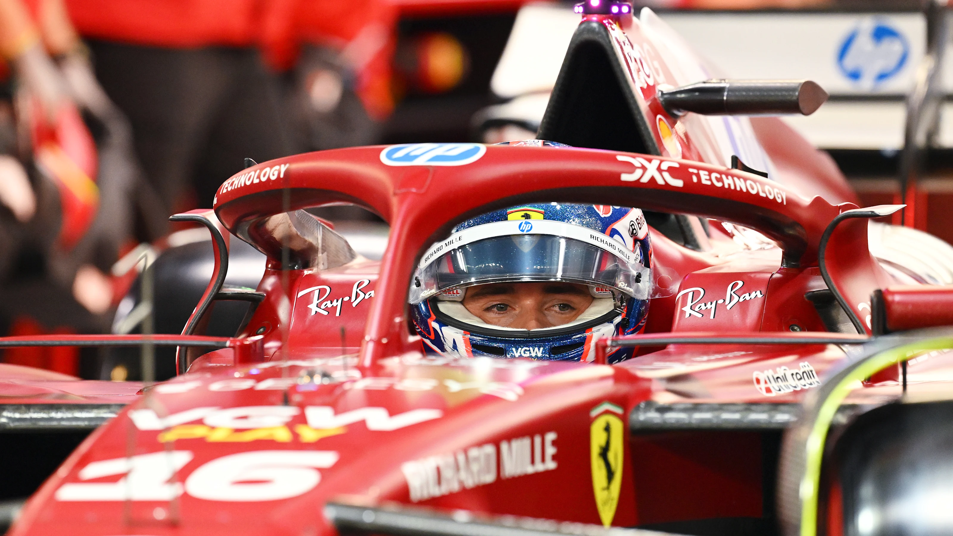 SINGAPORE, SINGAPORE - OCTOBER 04: Charles Leclerc of Monaco and Scuderia Ferrari prepares to drive
