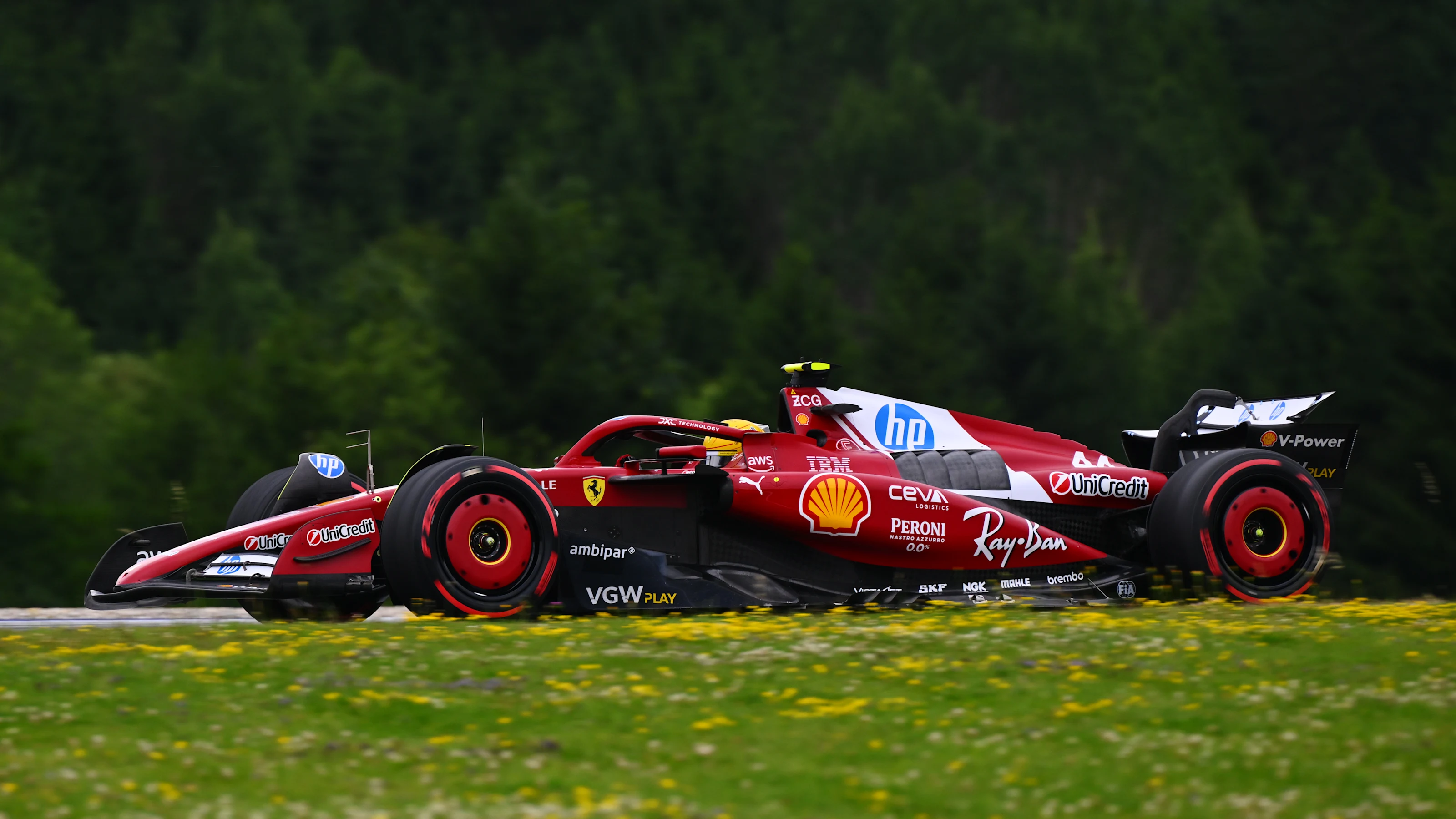 SPIELBERG, AUSTRIA - JUNE 27: Lewis Hamilton of Great Britain driving the (44) Scuderia Ferrari