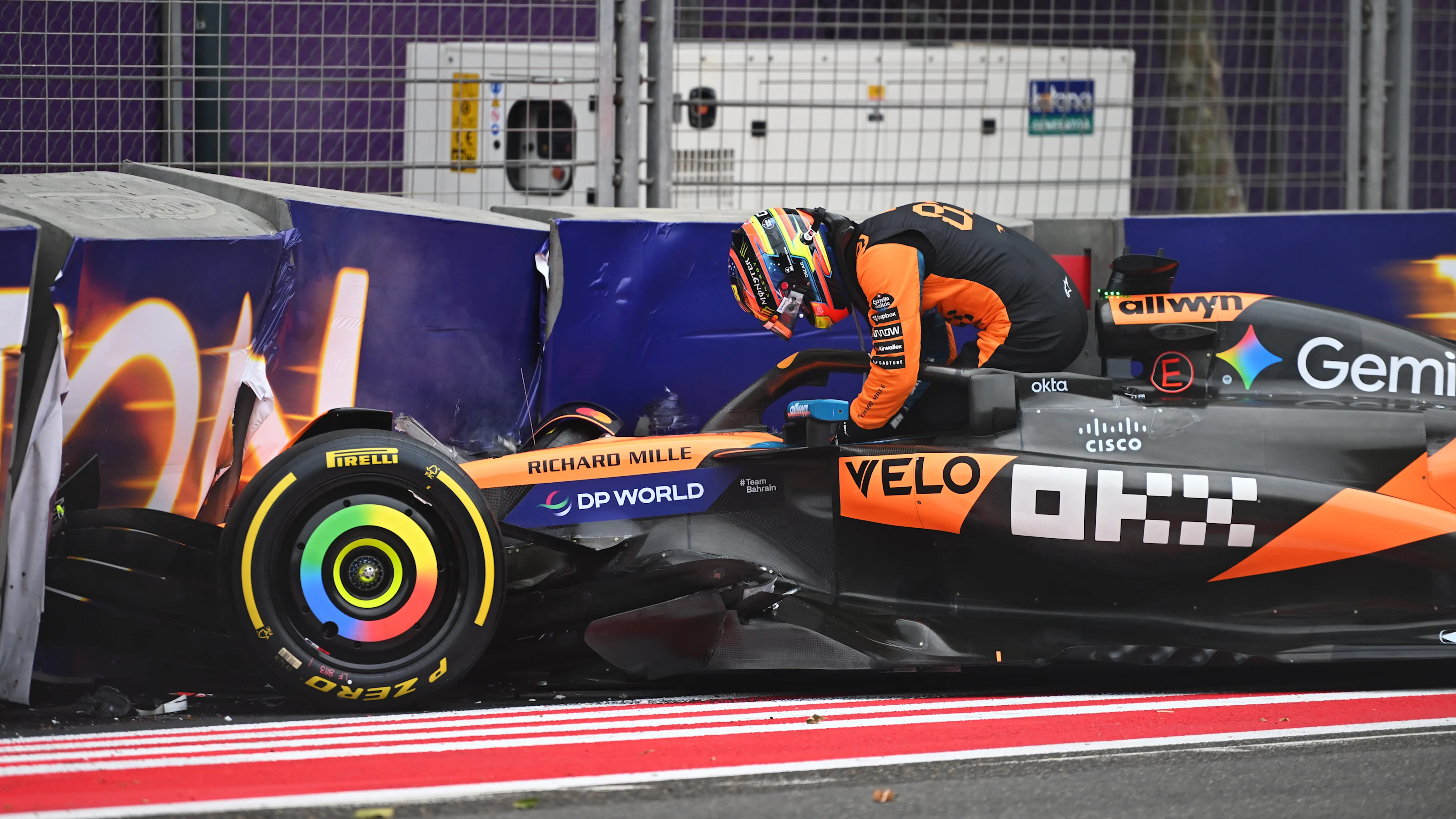 BAKU, AZERBAIJAN - SEPTEMBER 21: Oscar Piastri of Australia and McLaren climbs out of his damaged