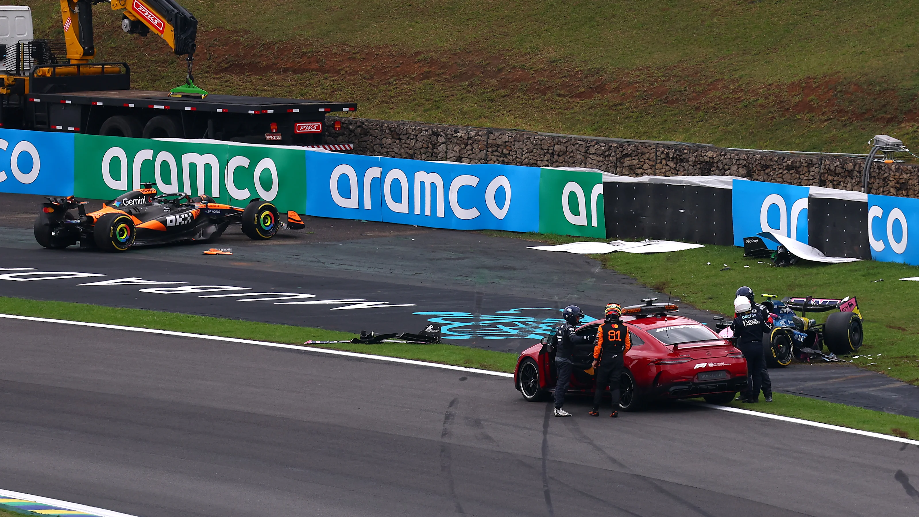SAO PAULO, BRAZIL - NOVEMBER 08: The FIA Medical car assists Oscar Piastri of Australia and McLaren