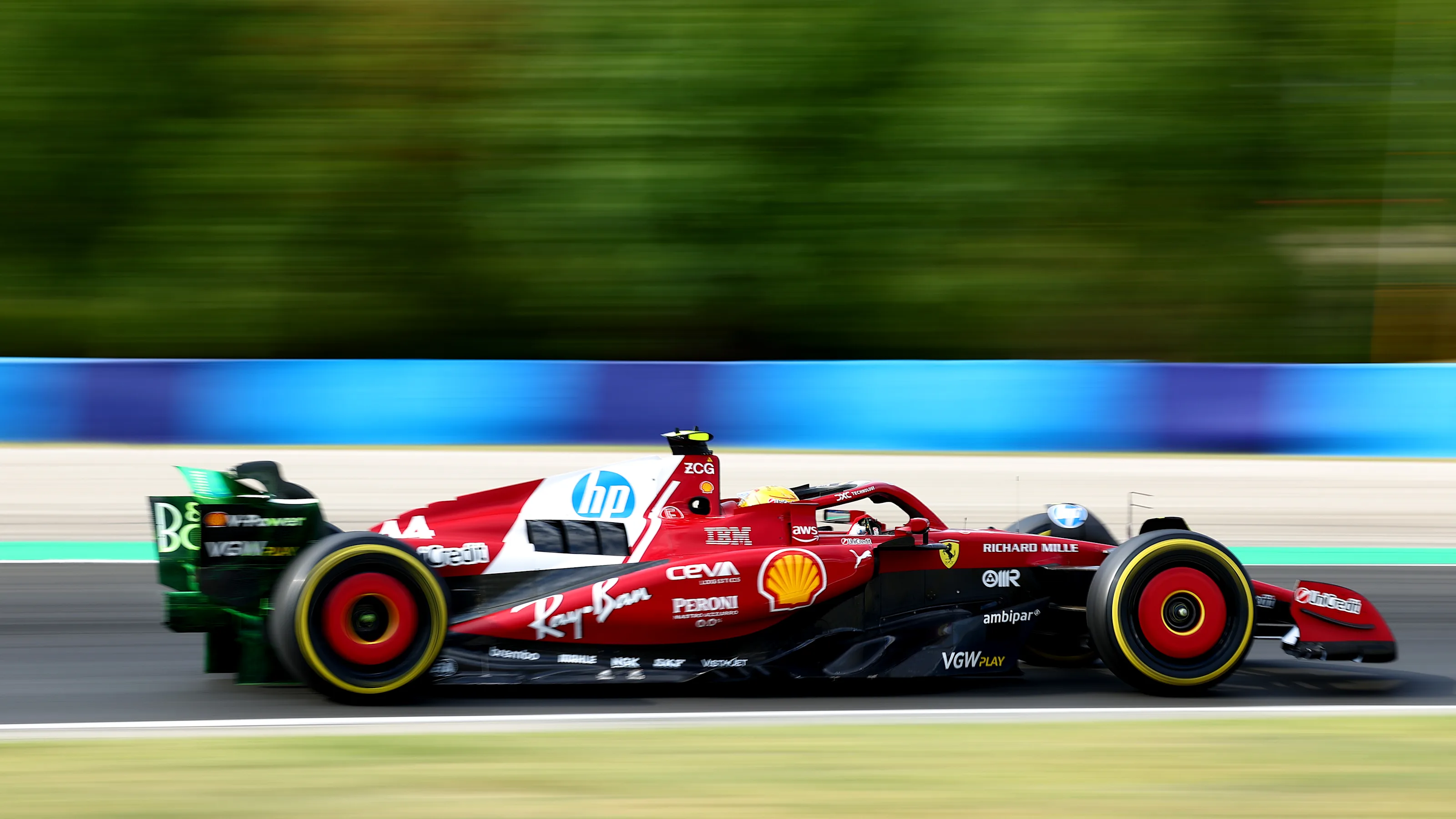 BUDAPEST, HUNGARY - AUGUST 01: Lewis Hamilton of Great Britain driving the (44) Scuderia Ferrari