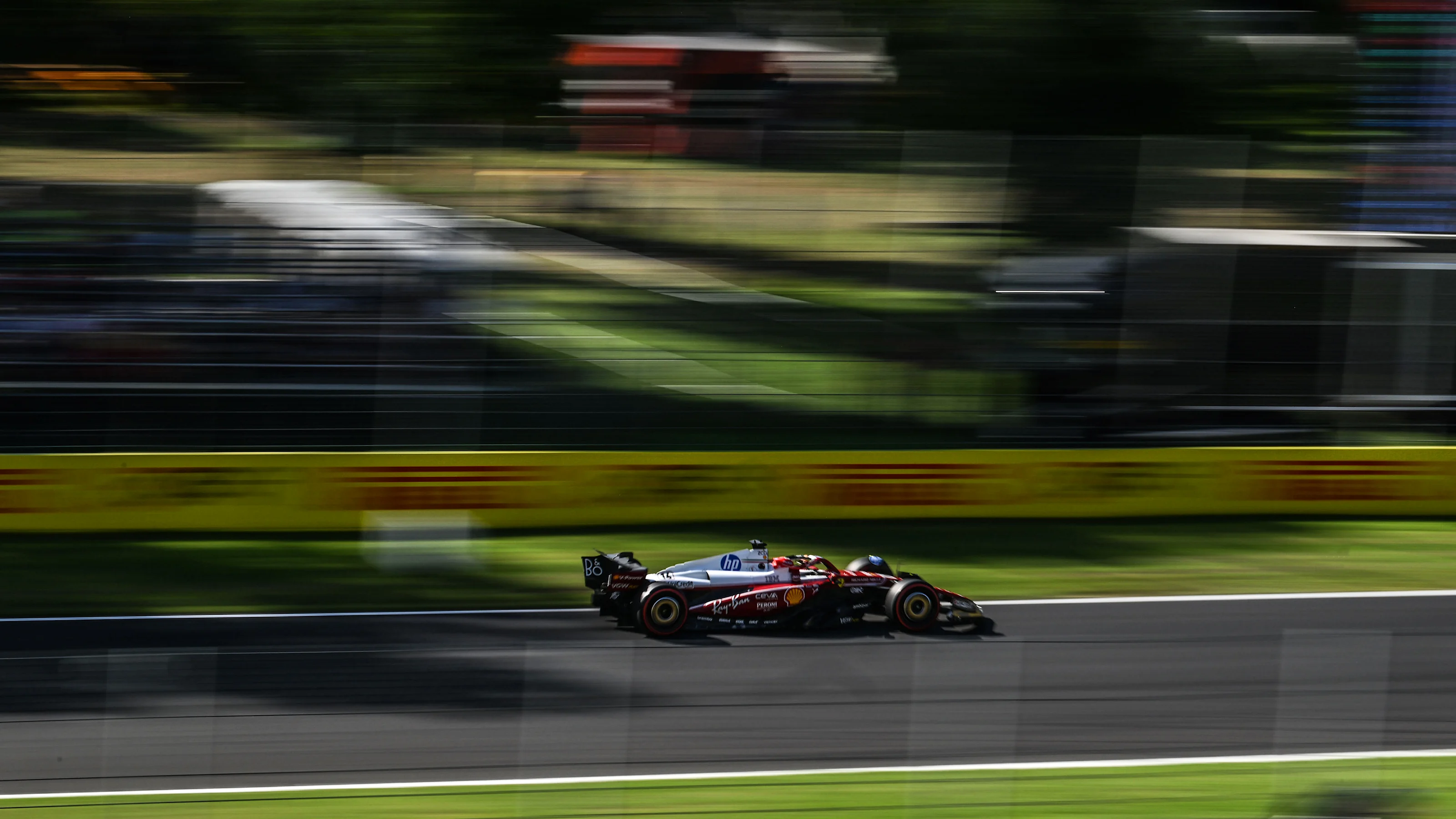 MONZA, ITALY - SEPTEMBER 06: Charles Leclerc of Monaco driving the (16) Scuderia Ferrari SF-25 on