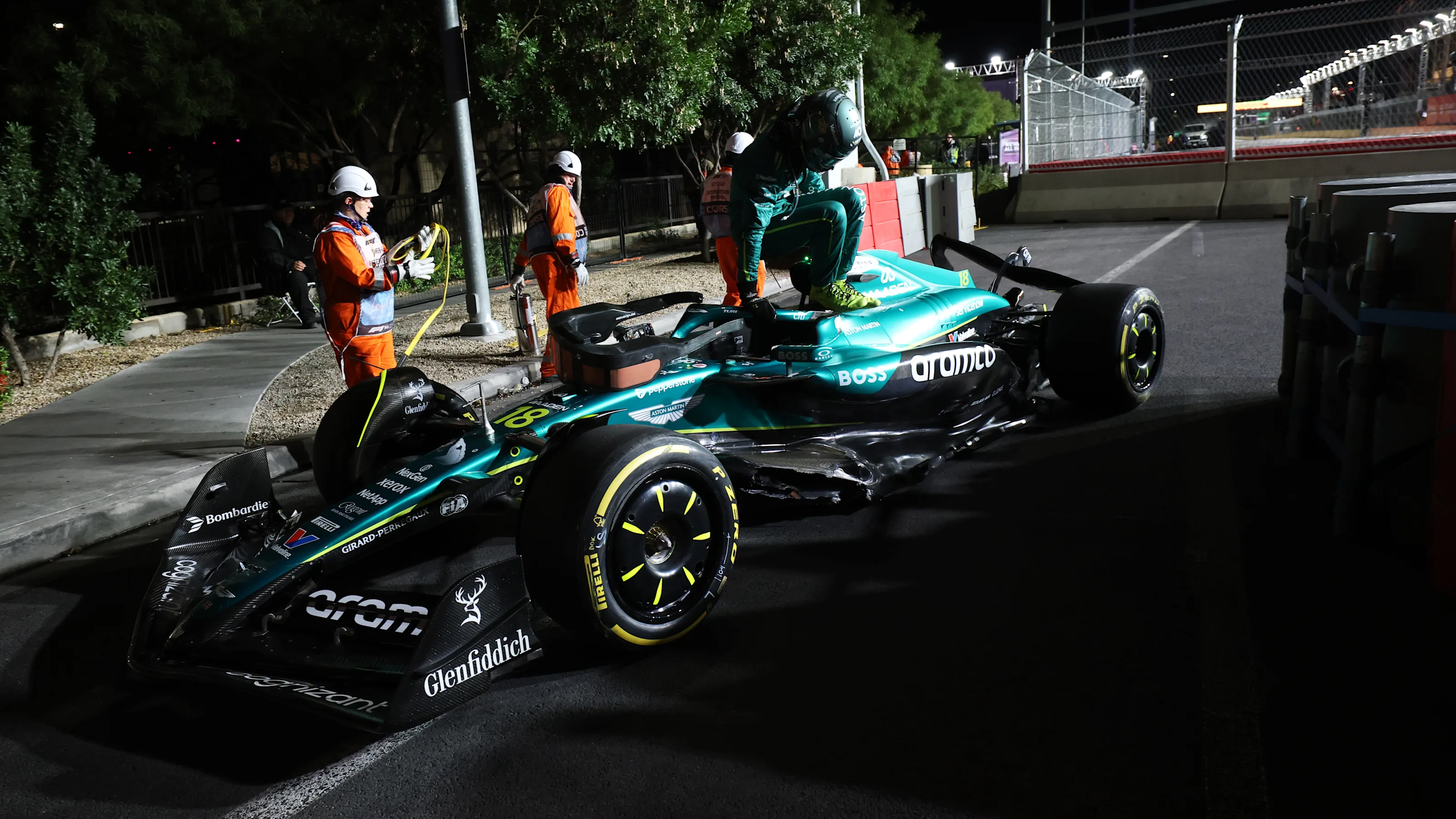 LAS VEGAS, NEVADA - NOVEMBER 22: Lance Stroll of Canada and Aston Martin F1 Team retires after a