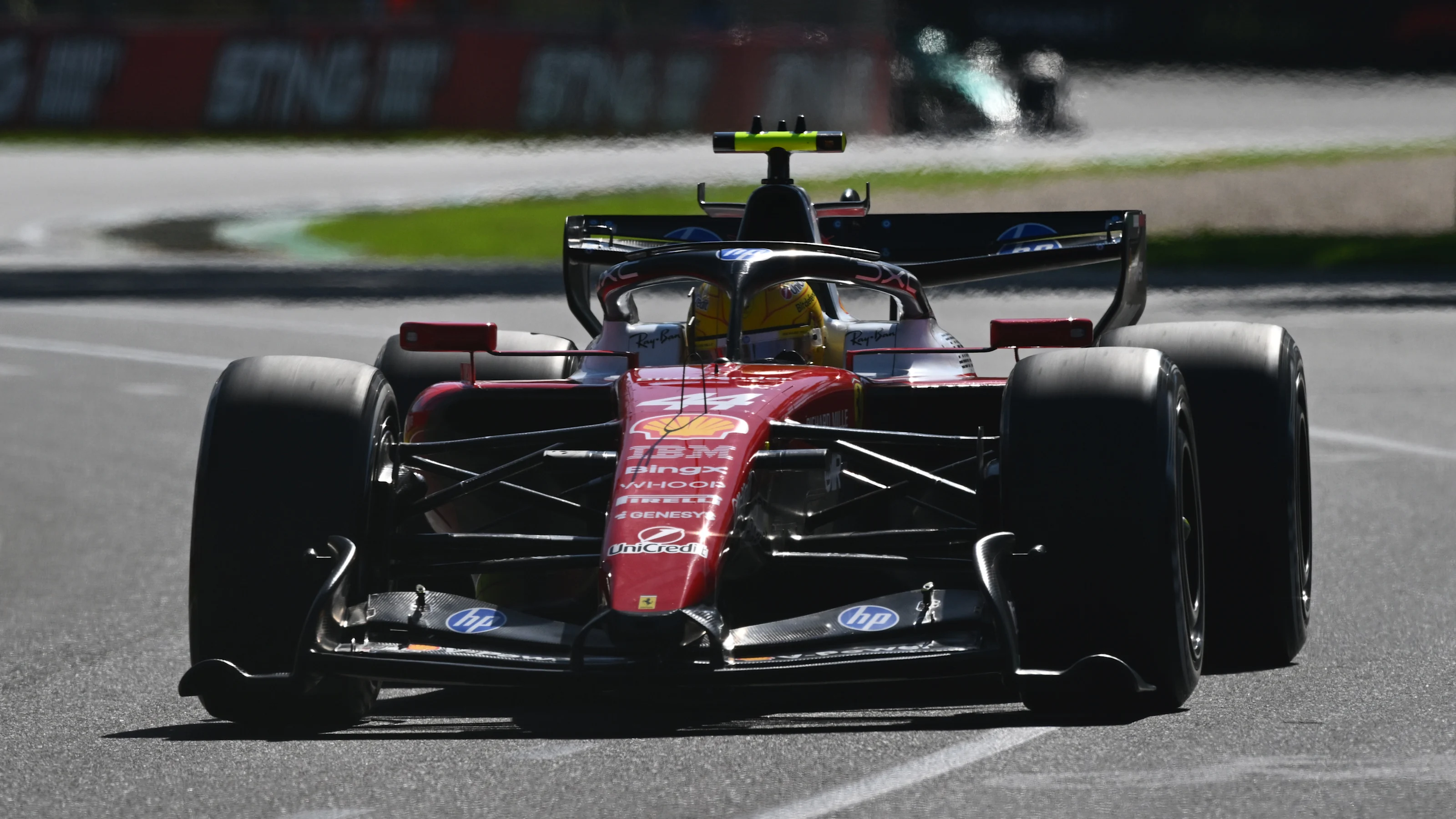 MELBOURNE, AUSTRALIA - MARCH 06: Lewis Hamilton of Great Britain driving the (44) Scuderia Ferrari