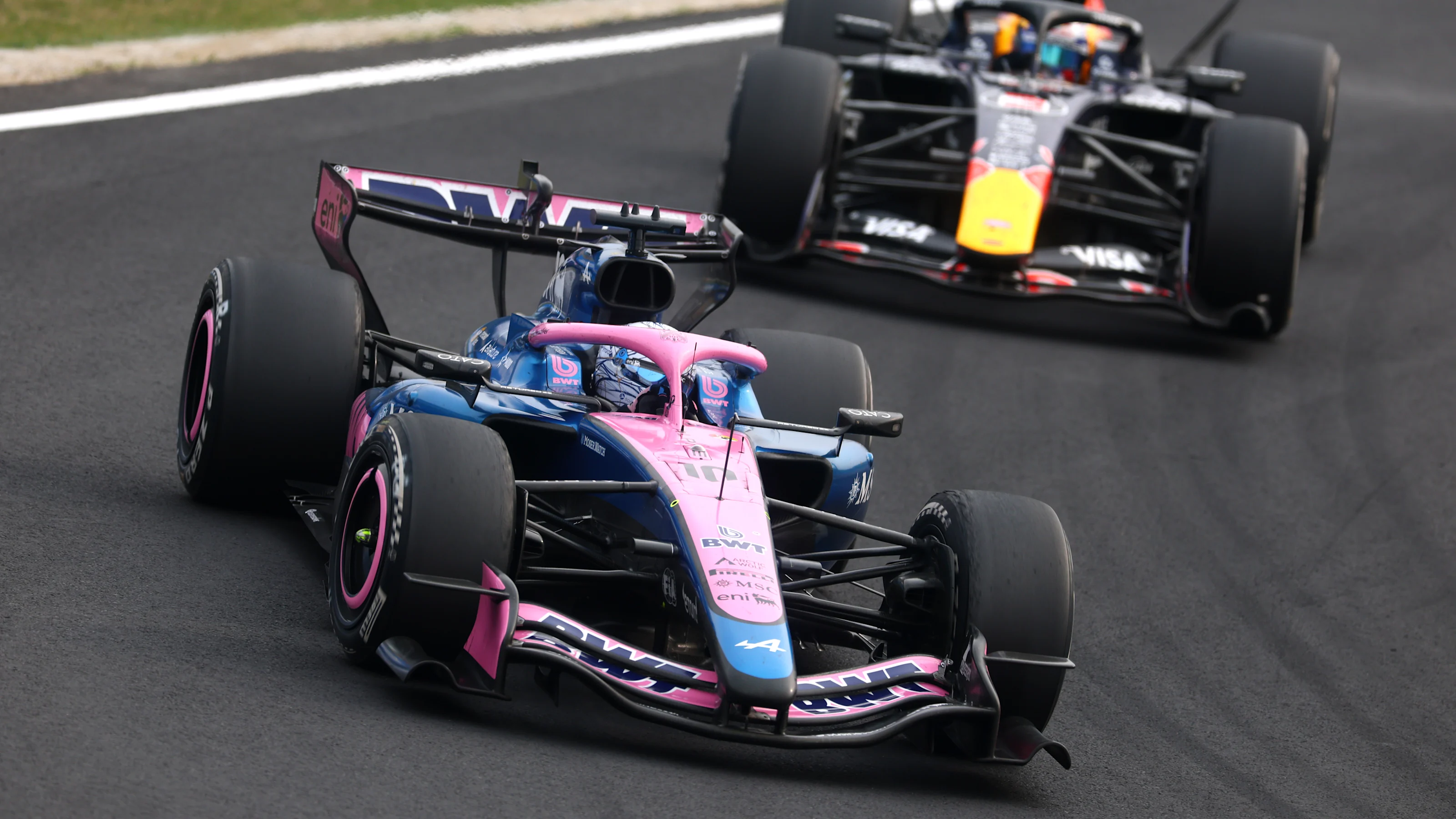 SUZUKA, JAPAN - MARCH 29: Pierre Gasly of France driving the (10) Alpine F1 A526 Mercedes leads Max