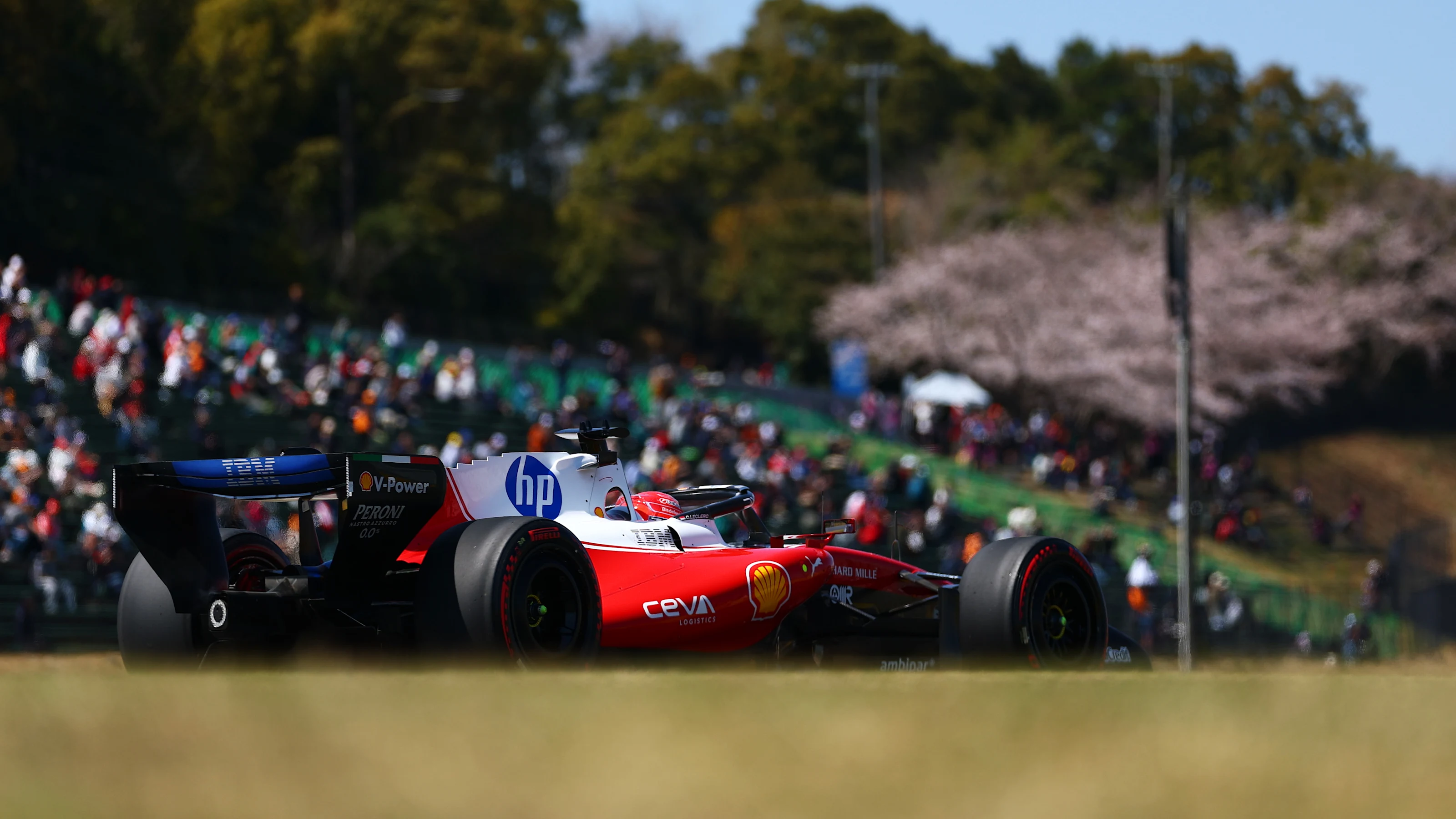 SUZUKA, JAPAN - MARCH 27: Charles Leclerc of Monaco driving the (16) Scuderia Ferrari SF-26 on