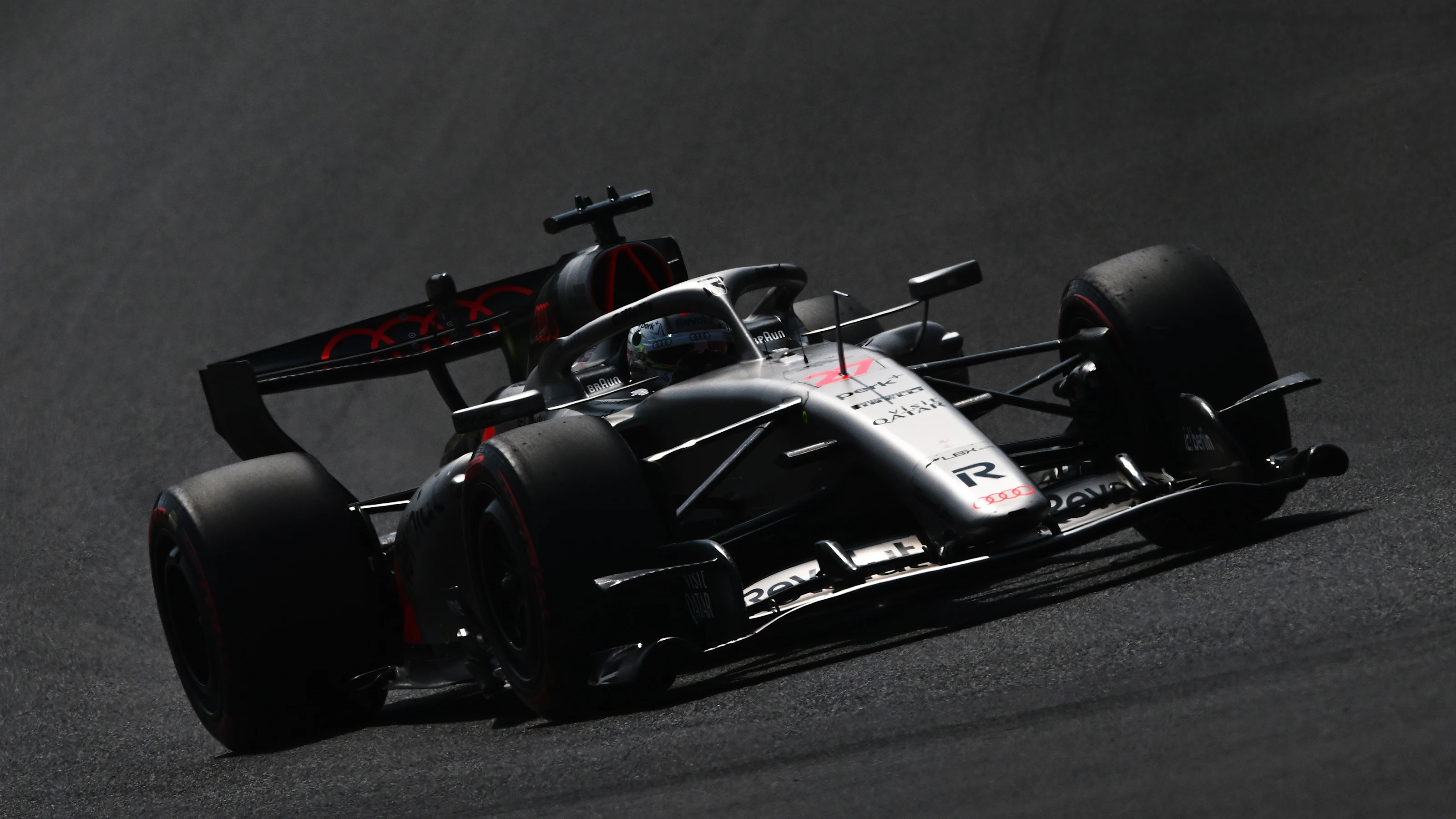 SUZUKA, JAPAN - MARCH 28: Nico Hulkenberg of Germany driving the (27) Audi F1 Team R26 on track