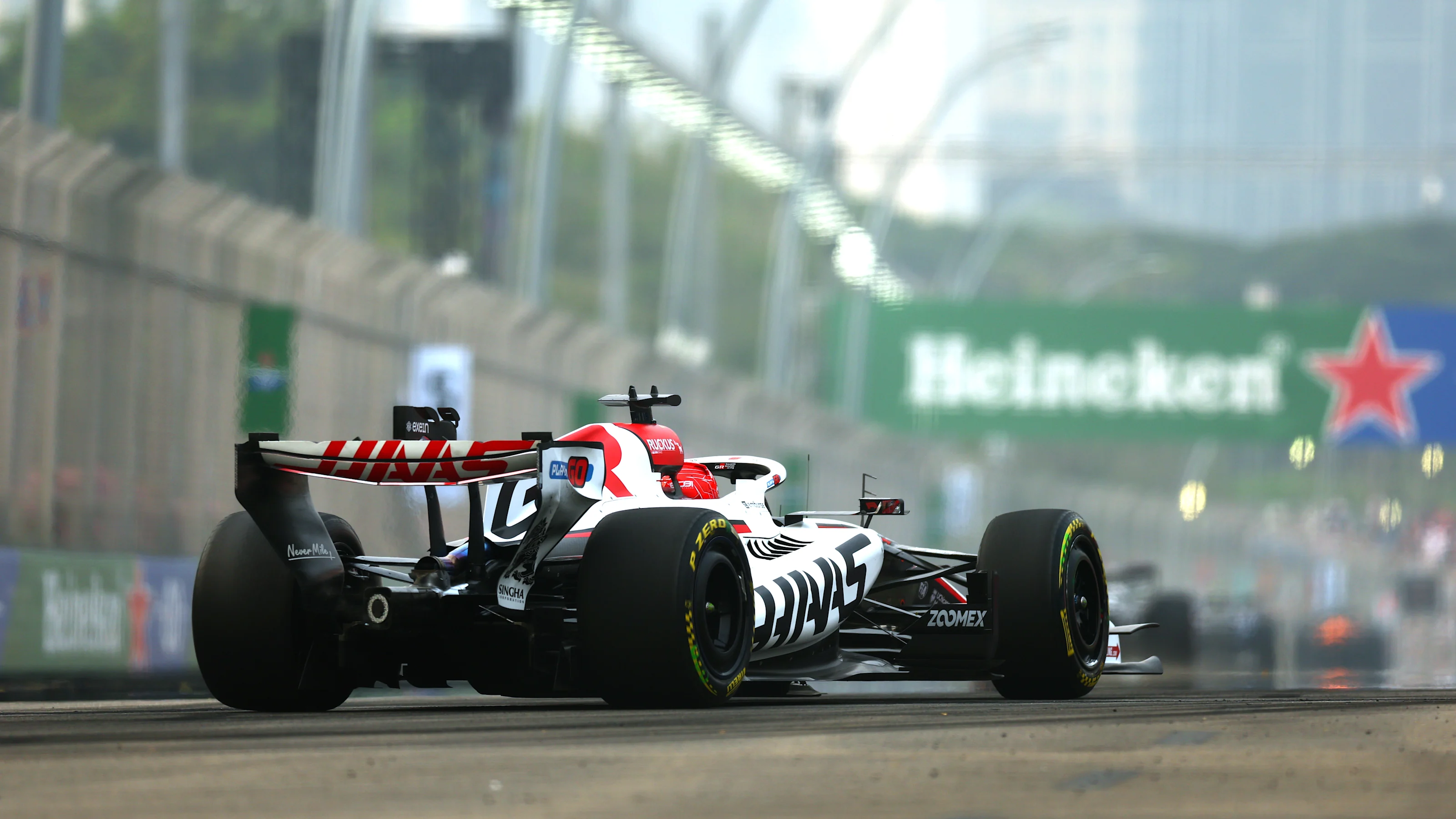 SINGAPORE, SINGAPORE - OCTOBER 09: Esteban Ocon of France driving the (31) Haas F1 VF-26 Ferrari on