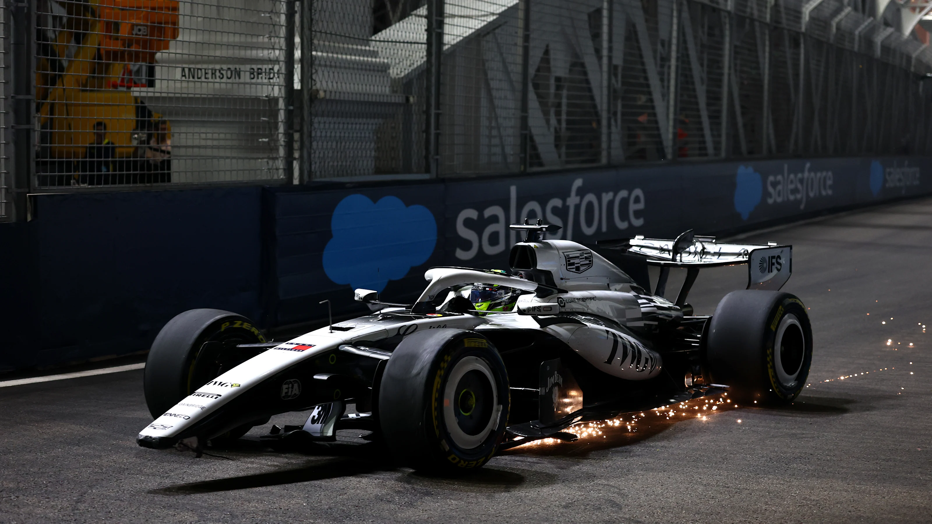 SINGAPORE, SINGAPORE - OCTOBER 09: Sergio Perez of Mexico driving the (11) Cadillac F1 Team MAC-26