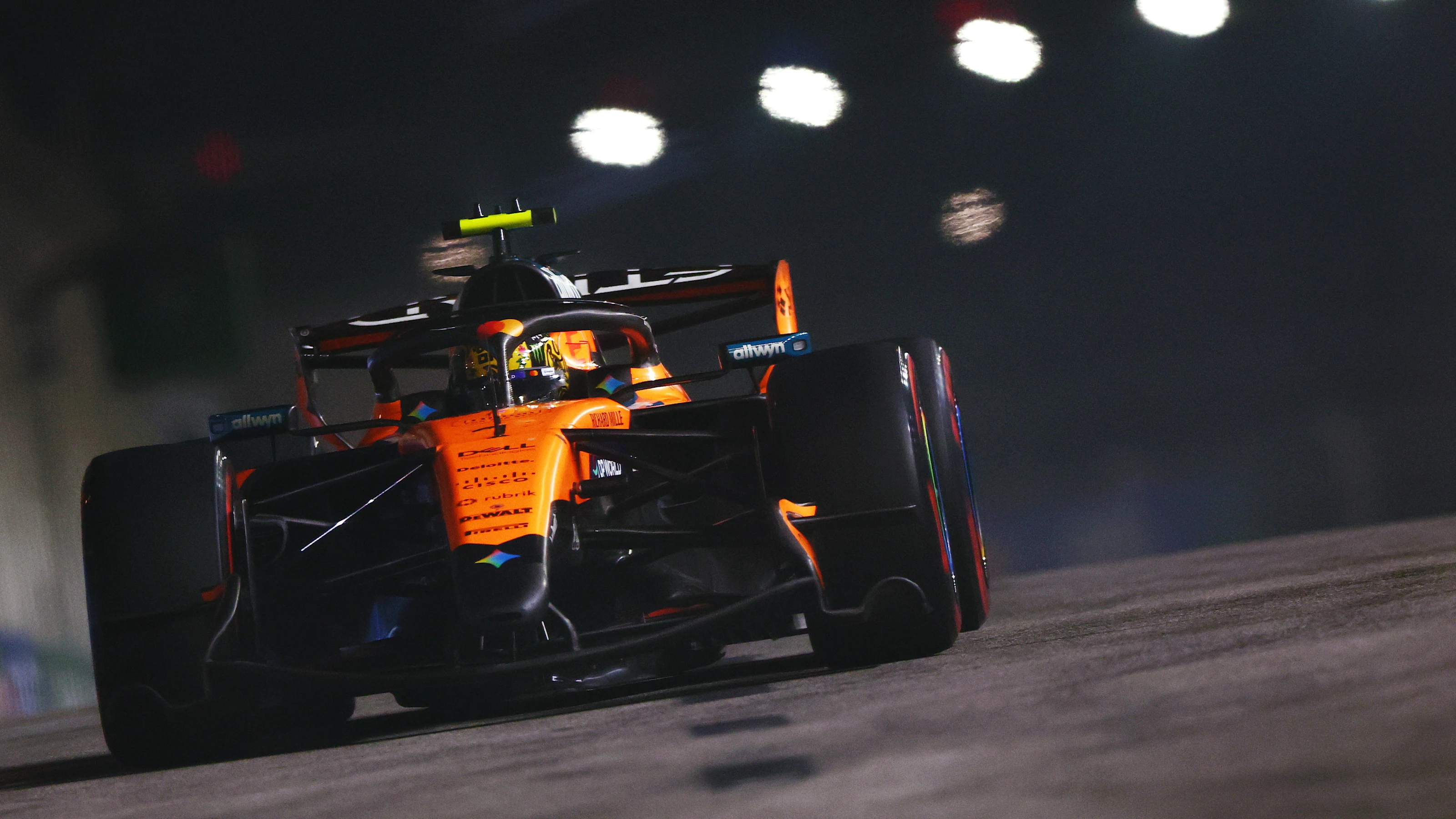 SINGAPORE, SINGAPORE - OCTOBER 10: Lando Norris of Great Britain driving the (1) McLaren MCL40