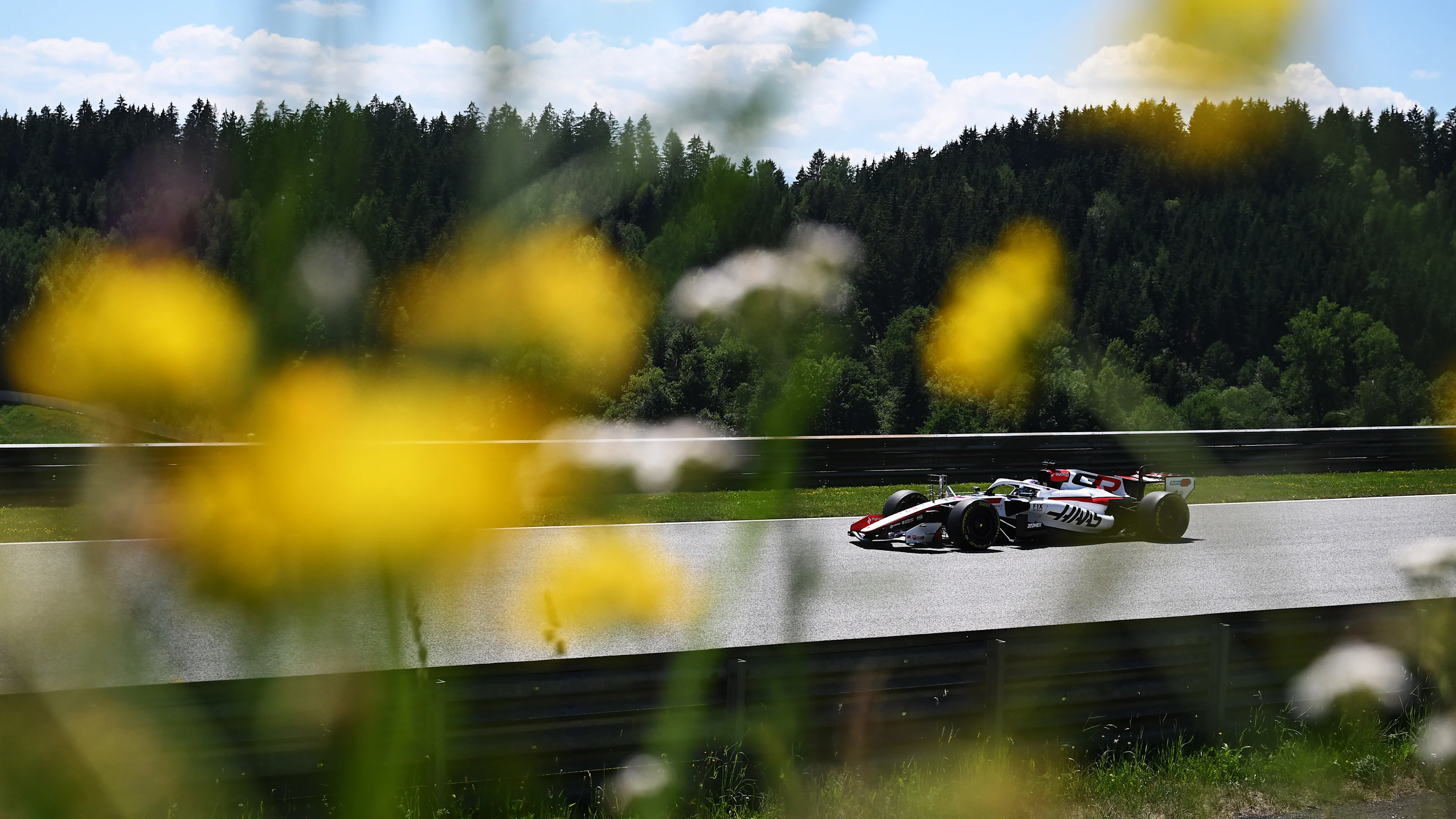 SPIELBERG, AUSTRIA - JUNE 26: Ryo Hirakawa of Japan driving the (50) Haas F1 VF-26 Ferrari on track