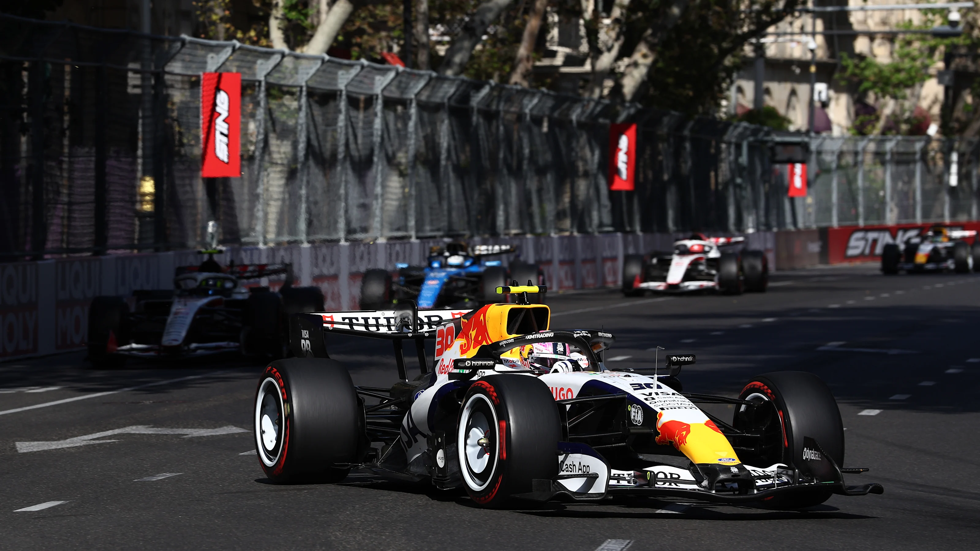BAKU, AZERBAIJAN - SEPTEMBER 26: Liam Lawson of New Zealand driving the (30) Visa Cash App Racing