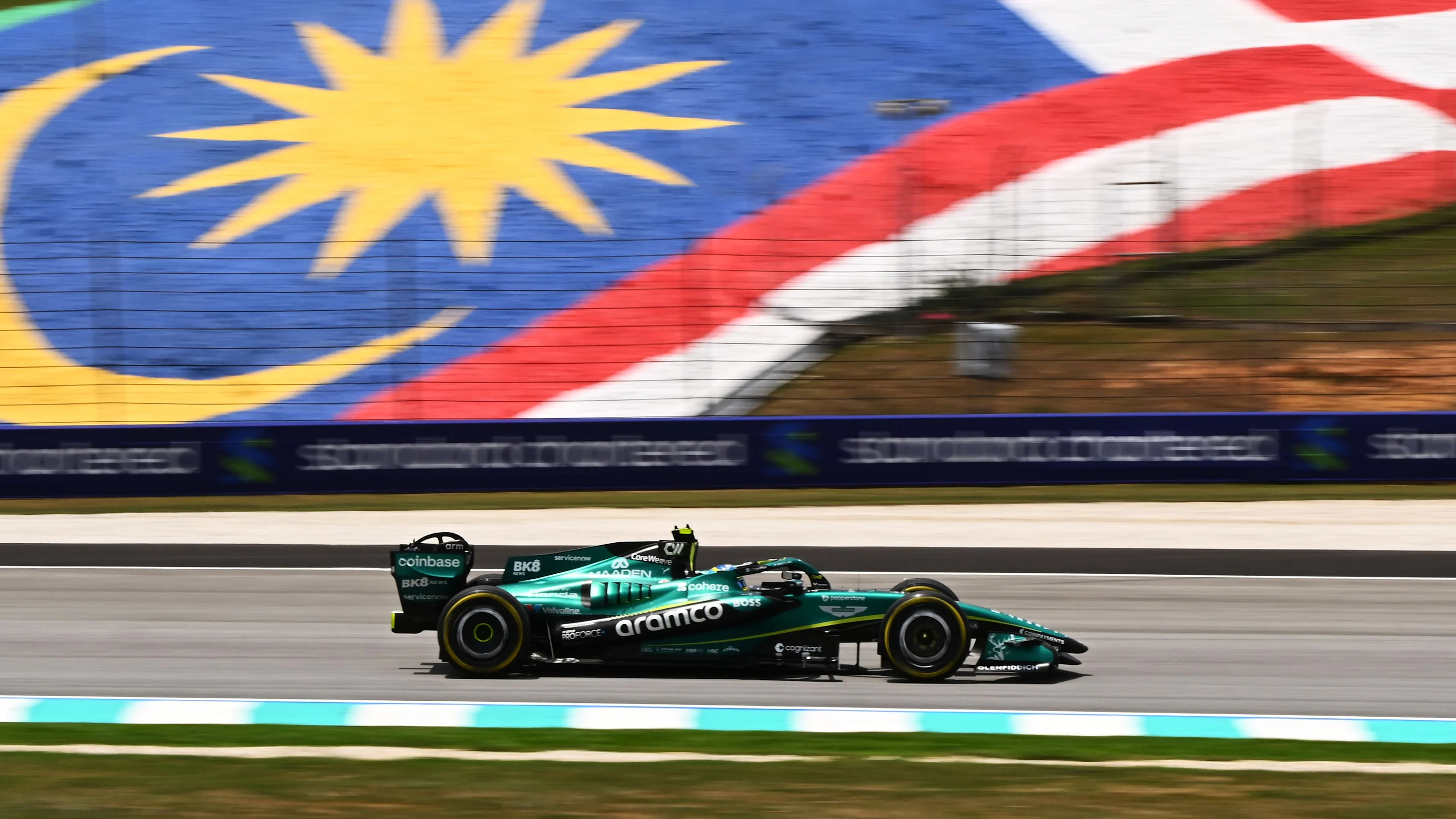 KUALA LUMPUR, MALAYSIA - OCTOBER 02: Fernando Alonso of Spain driving the (14) Aston Martin F1 Team