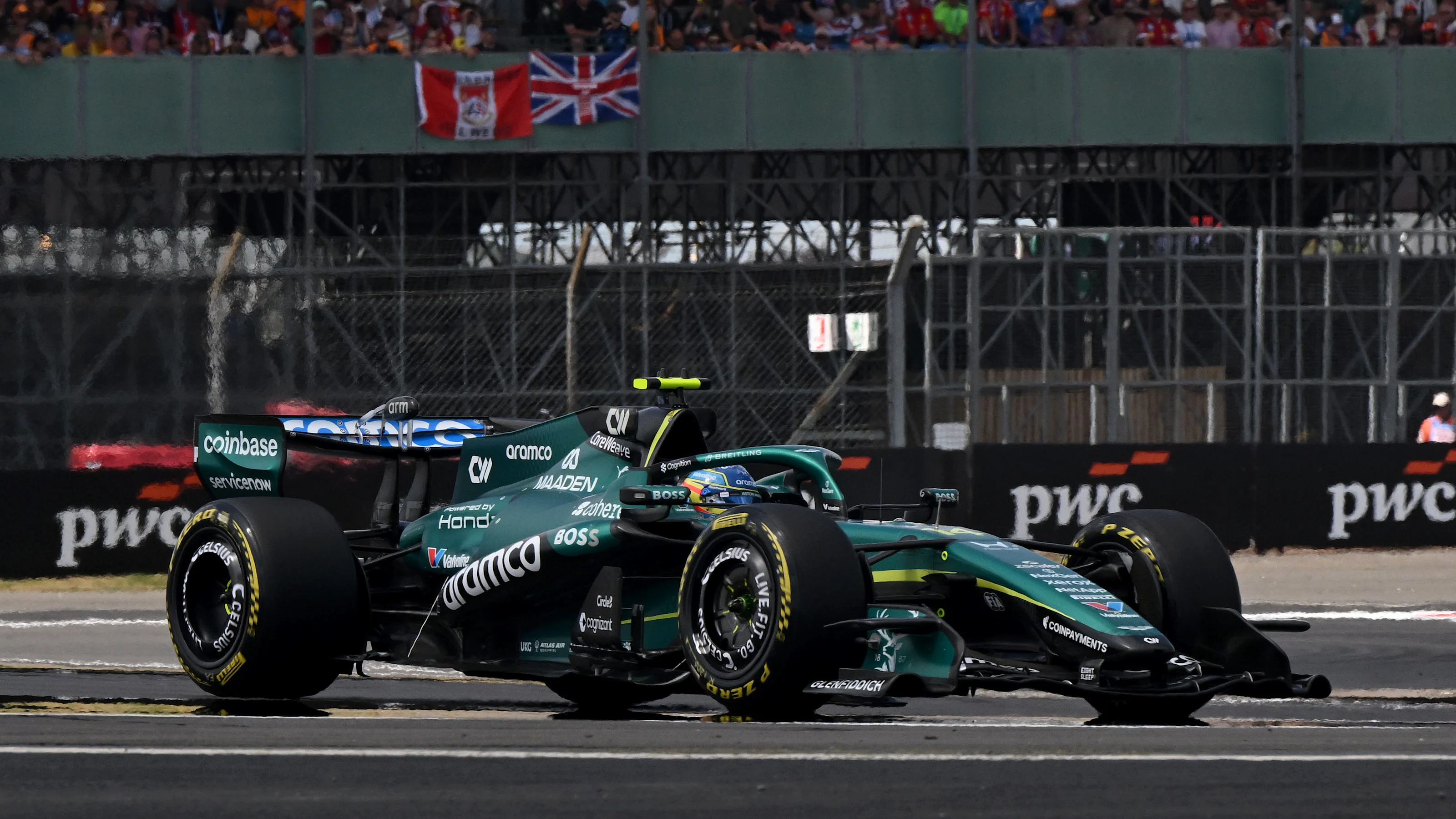 NORTHAMPTON, ENGLAND - JULY 05: Fernando Alonso of Spain driving the (14) Aston Martin F1 Team