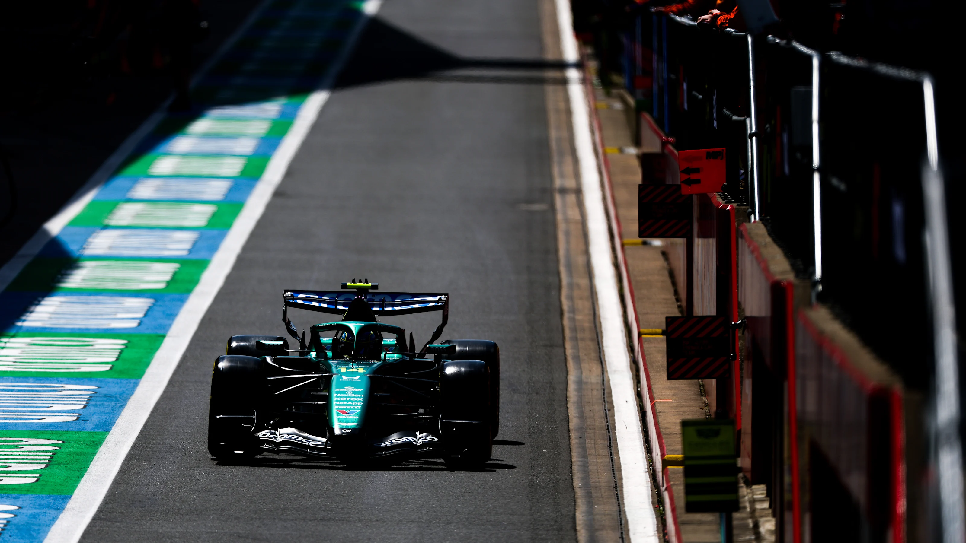 NORTHAMPTON, ENGLAND - JULY 03: Fernando Alonso of Spain driving the (14) Aston Martin F1 Team