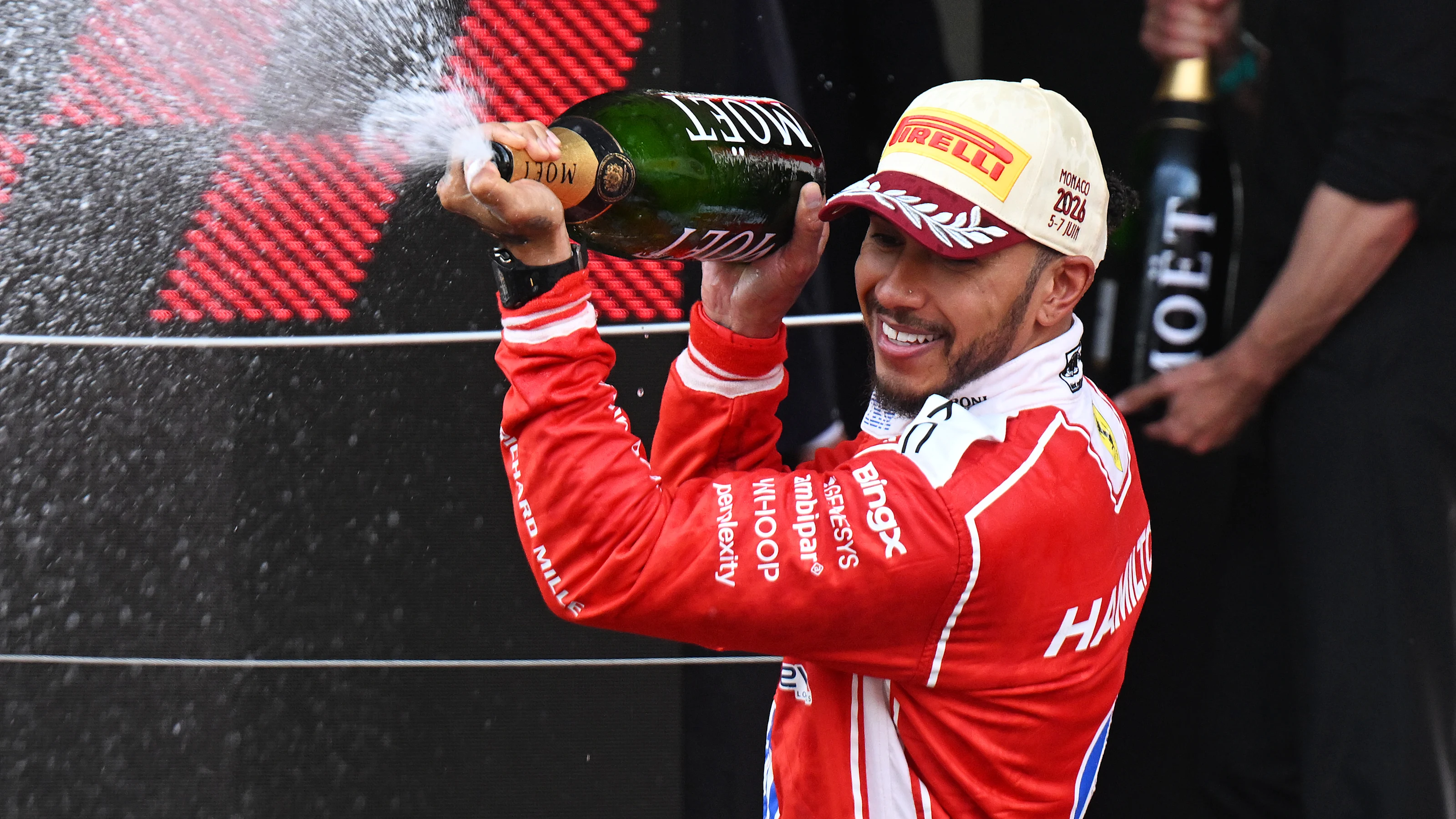 MONTE-CARLO, MONACO - JUNE 07: Second placed Lewis Hamilton of Great Britain and Scuderia Ferrari