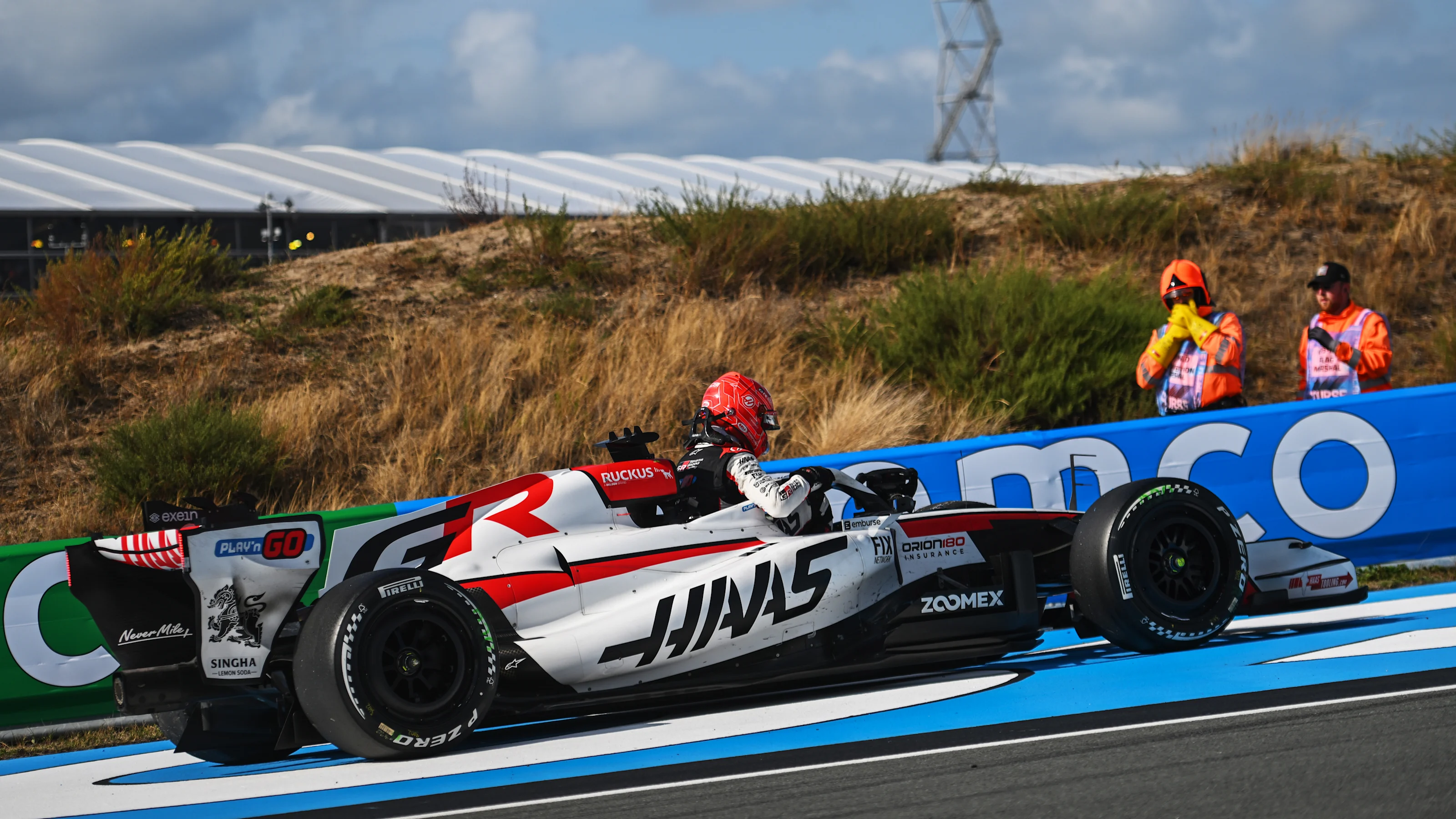 ZANDVOORT, NETHERLANDS - AUGUST 23: Esteban Ocon of France and Haas F1 climbs out of his car and