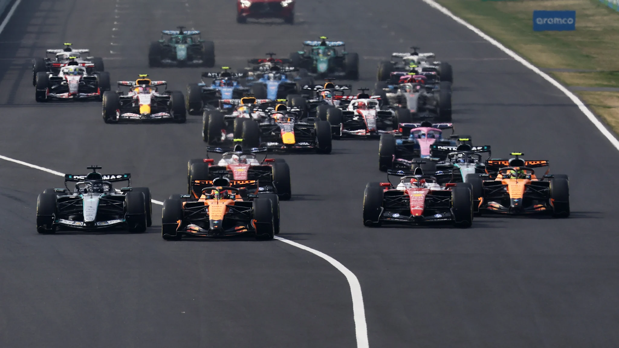 The 2026 Japanese Grand Prix field at Suzuka, with Ferrari and Williams cars among the pack