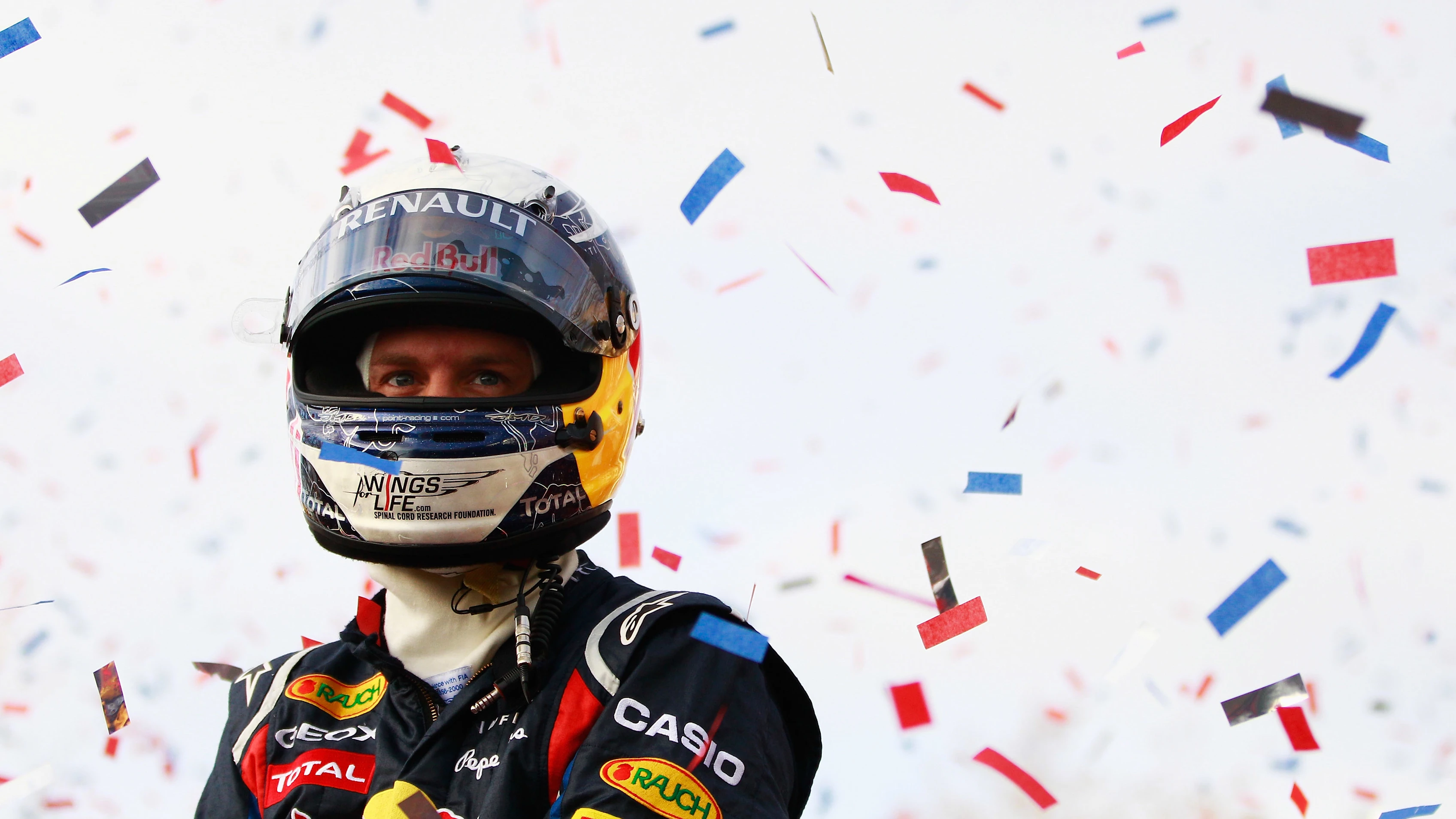 MILTON KEYNES, ENGLAND - DECEMBER 10: Sebastian Vettel of Germany and Red Bull Racing acknowledges