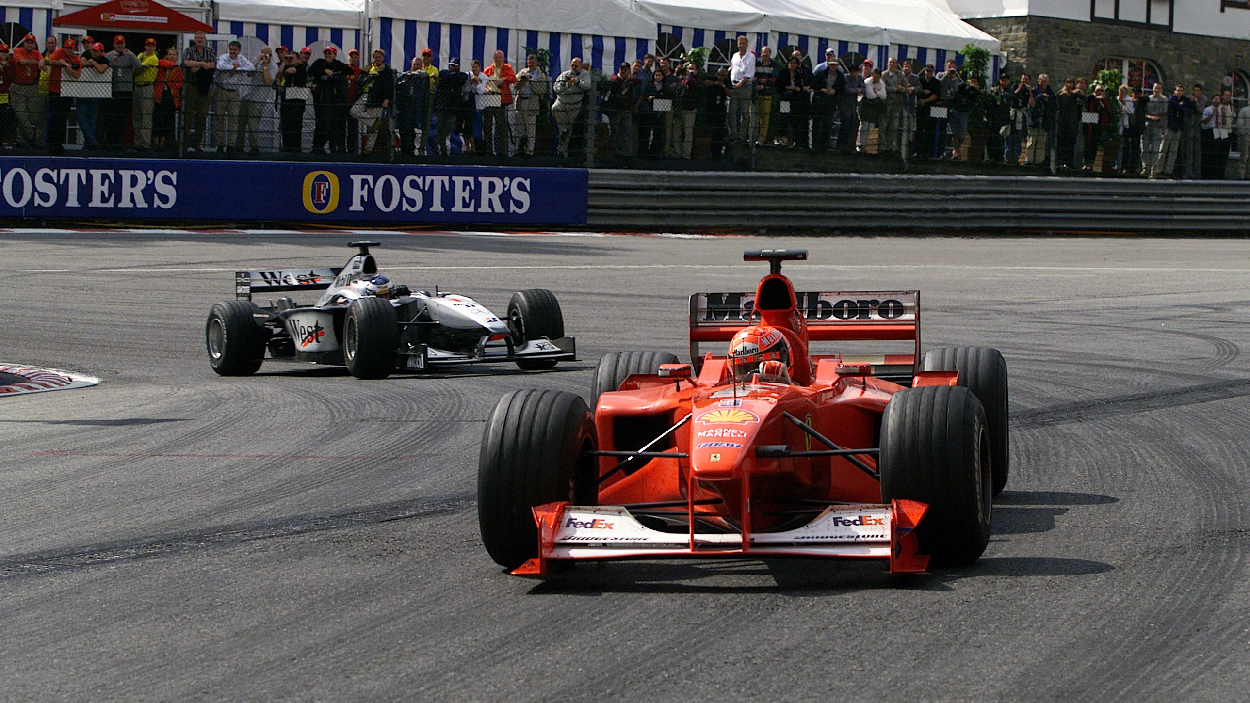 Spa-Francorchamps, Belgium - August 27: Michael Schumacher (Ferrari F1-2000) followed by Mika