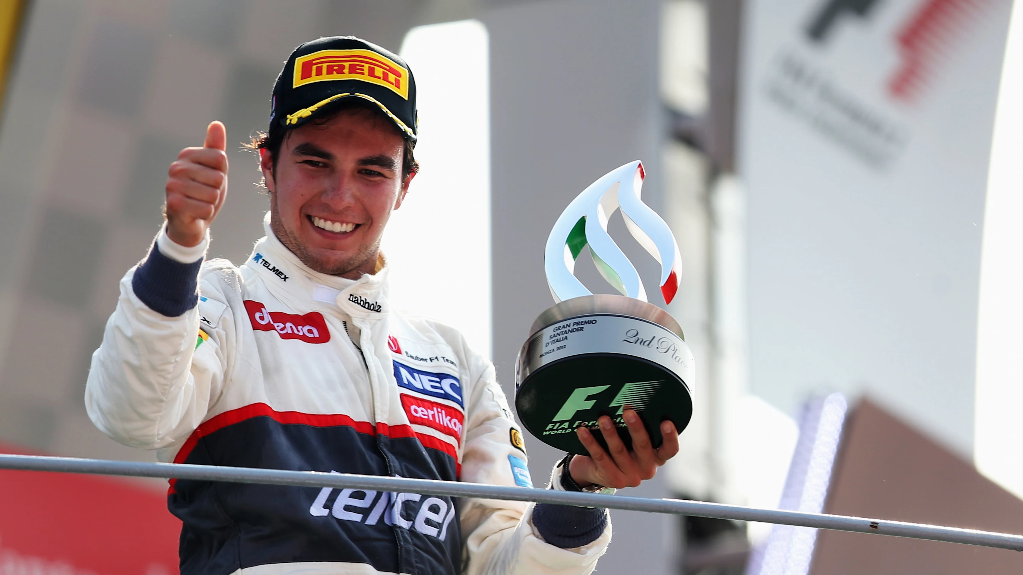 MONZA, ITALY - SEPTEMBER 09: Sergio Perez of Mexico and Sauber F1 celebrates on the podium after