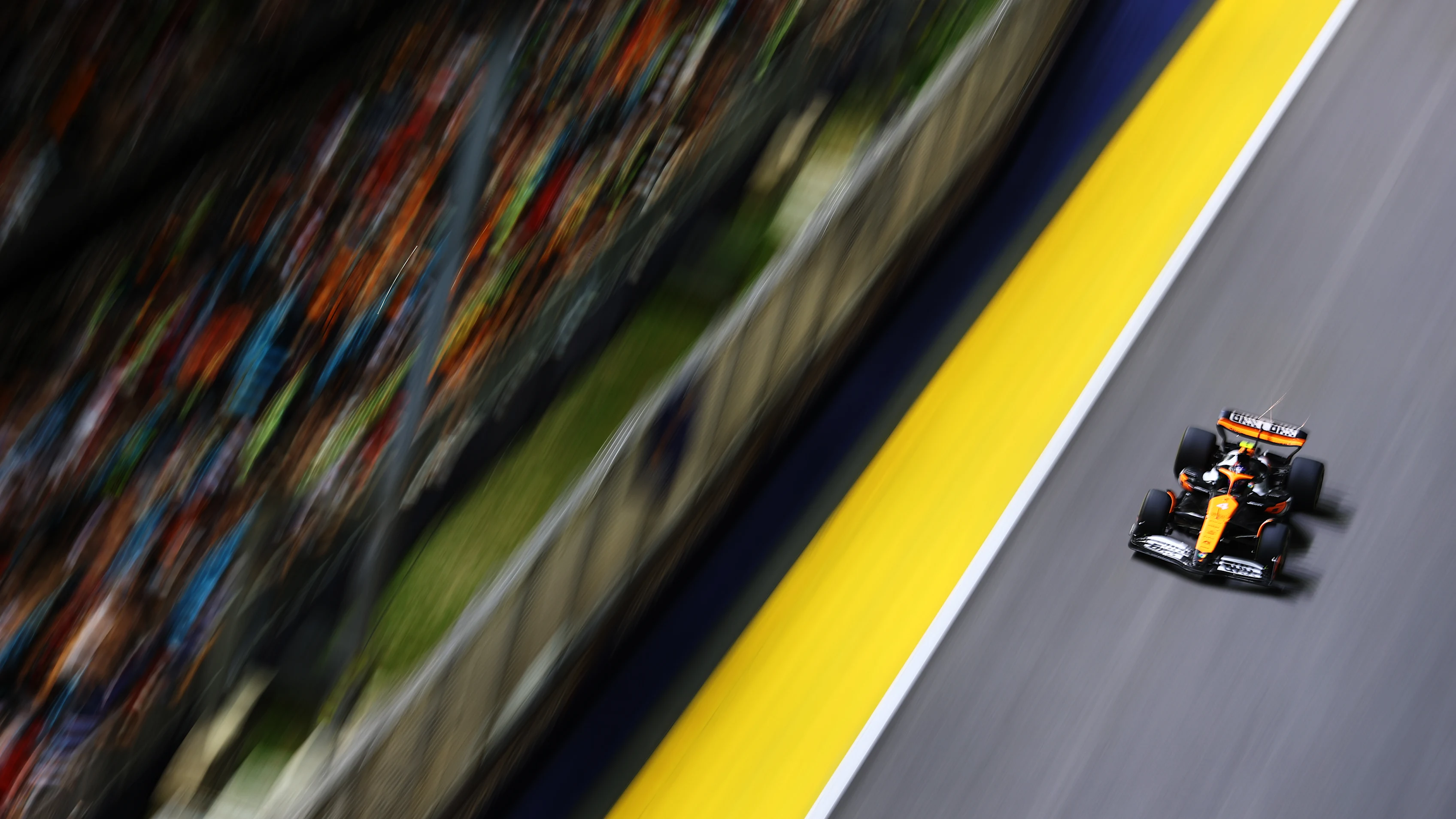 SINGAPORE, SINGAPORE - SEPTEMBER 22: Lando Norris of Great Britain driving the (4) McLaren MCL38