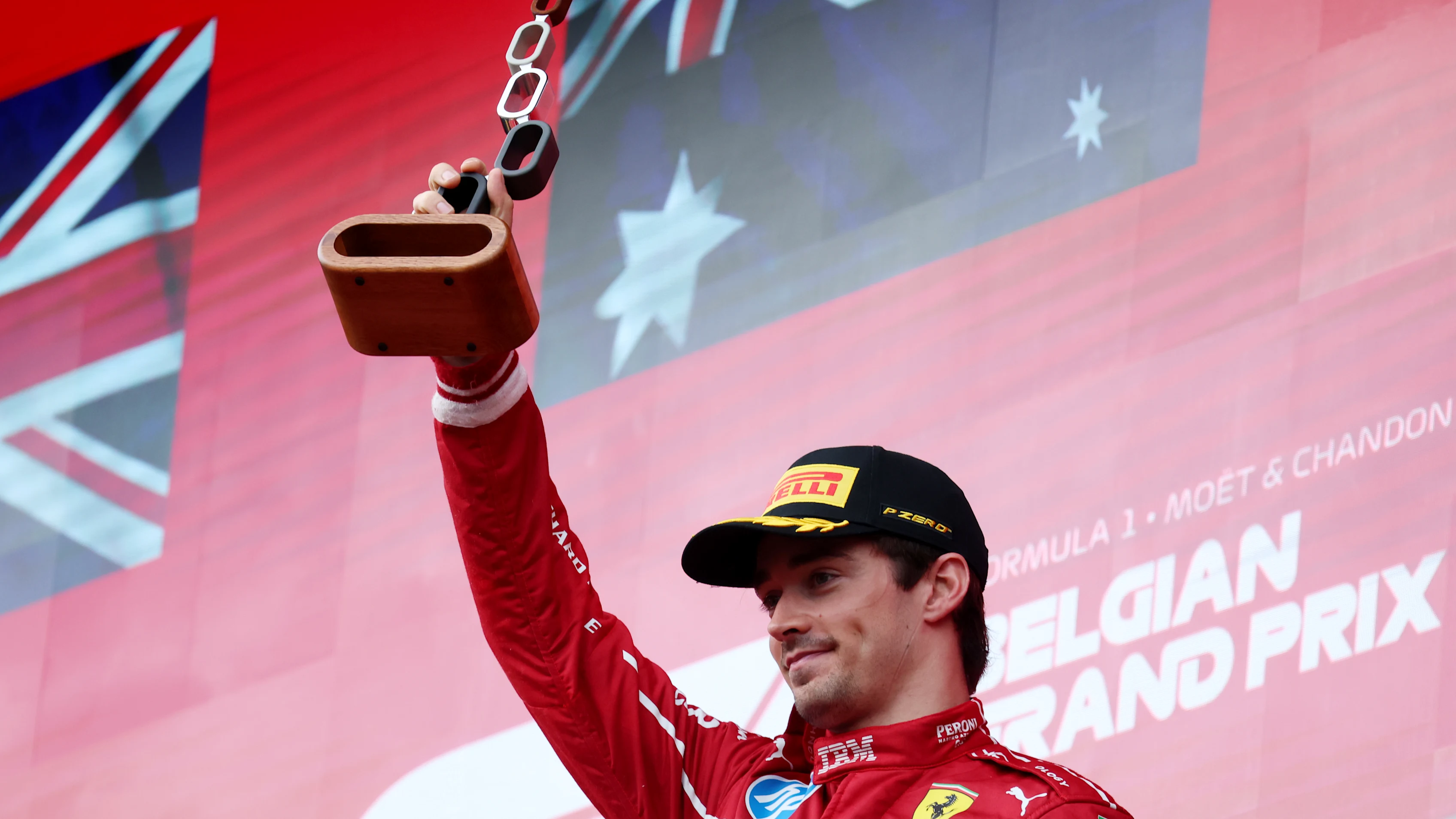 SPA, BELGIUM - JULY 27: Third placed Charles Leclerc of Monaco and Scuderia Ferrari lifts his
