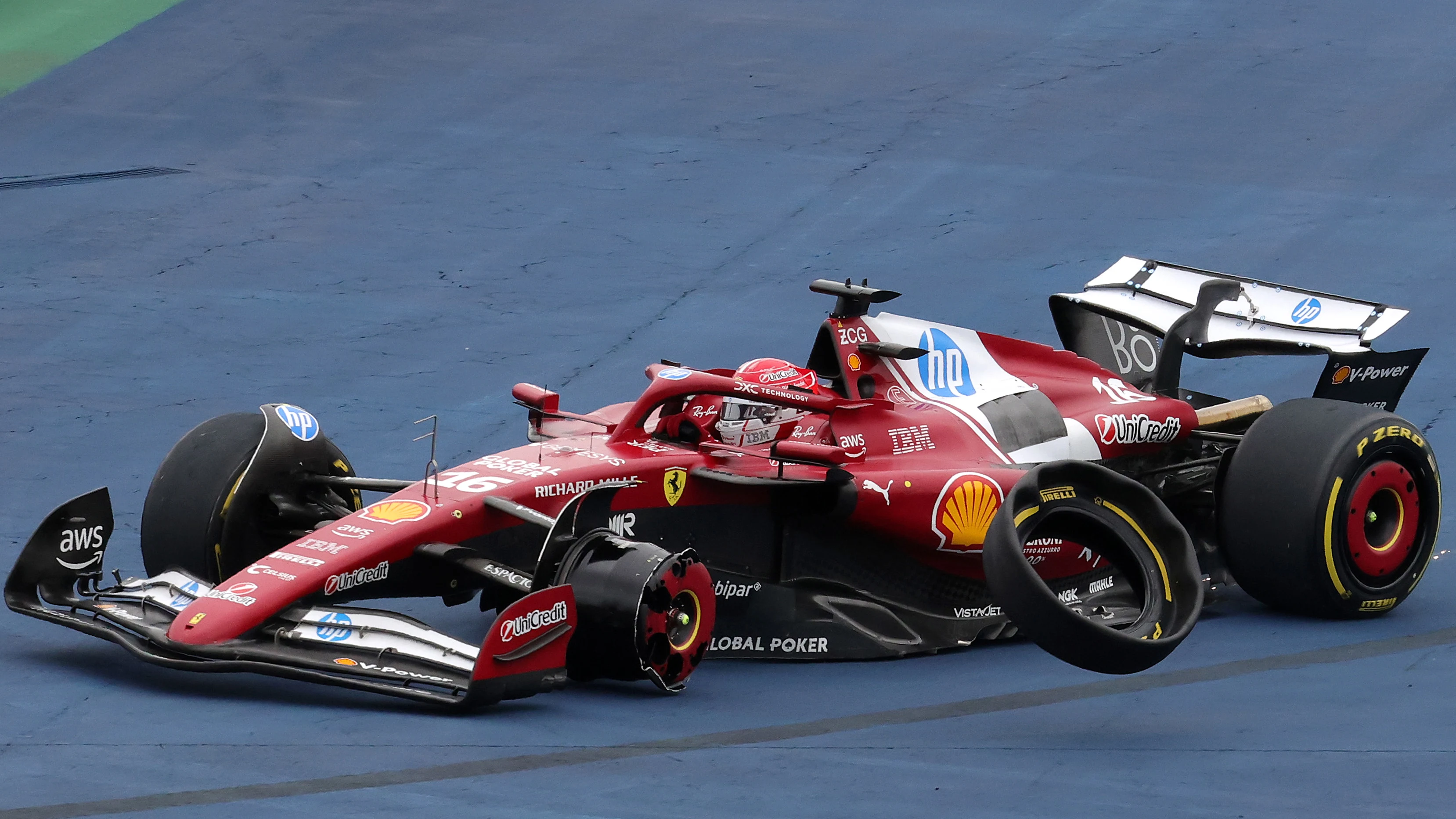 SAO PAULO, BRAZIL - NOVEMBER 09: Charles Leclerc of Monaco driving the (16) Scuderia Ferrari SF-25 crashes out at the restart during the F1 Grand Prix of Brazil at Autodromo Jose Carlos Pace on November 09, 2025 in Sao Paulo, Brazil. (Photo by Anni Graf - Formula 1/Formula 1 via Getty Images)