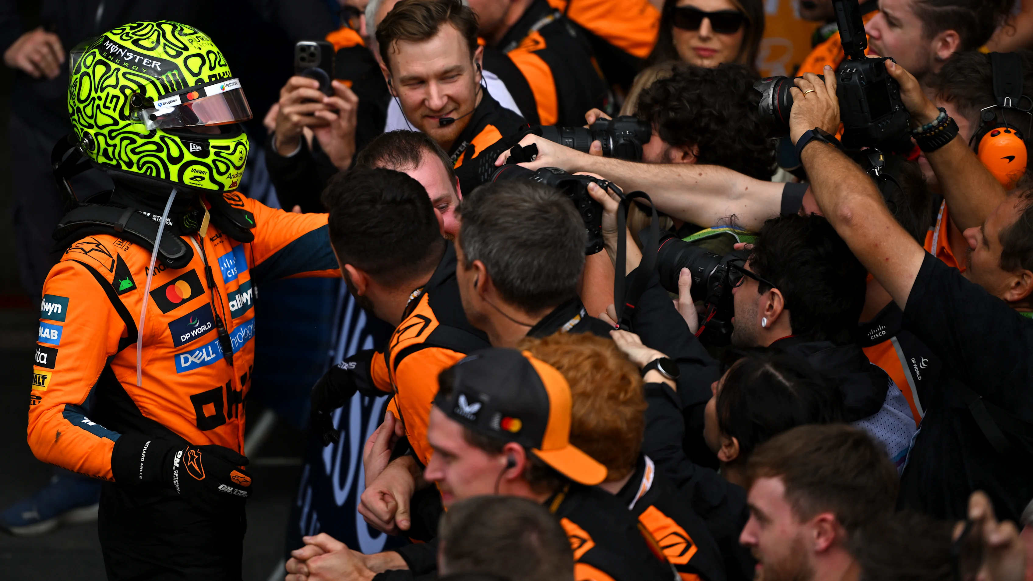 SAO PAULO, BRAZIL - NOVEMBER 09: Race winner Lando Norris of Great Britain and McLaren celebrates with his team in parc ferme during the F1 Grand Prix of Brazil at Autodromo Jose Carlos Pace on November 09, 2025 in Sao Paulo, Brazil. (Photo by Rudy Carezzevoli/Getty Images)