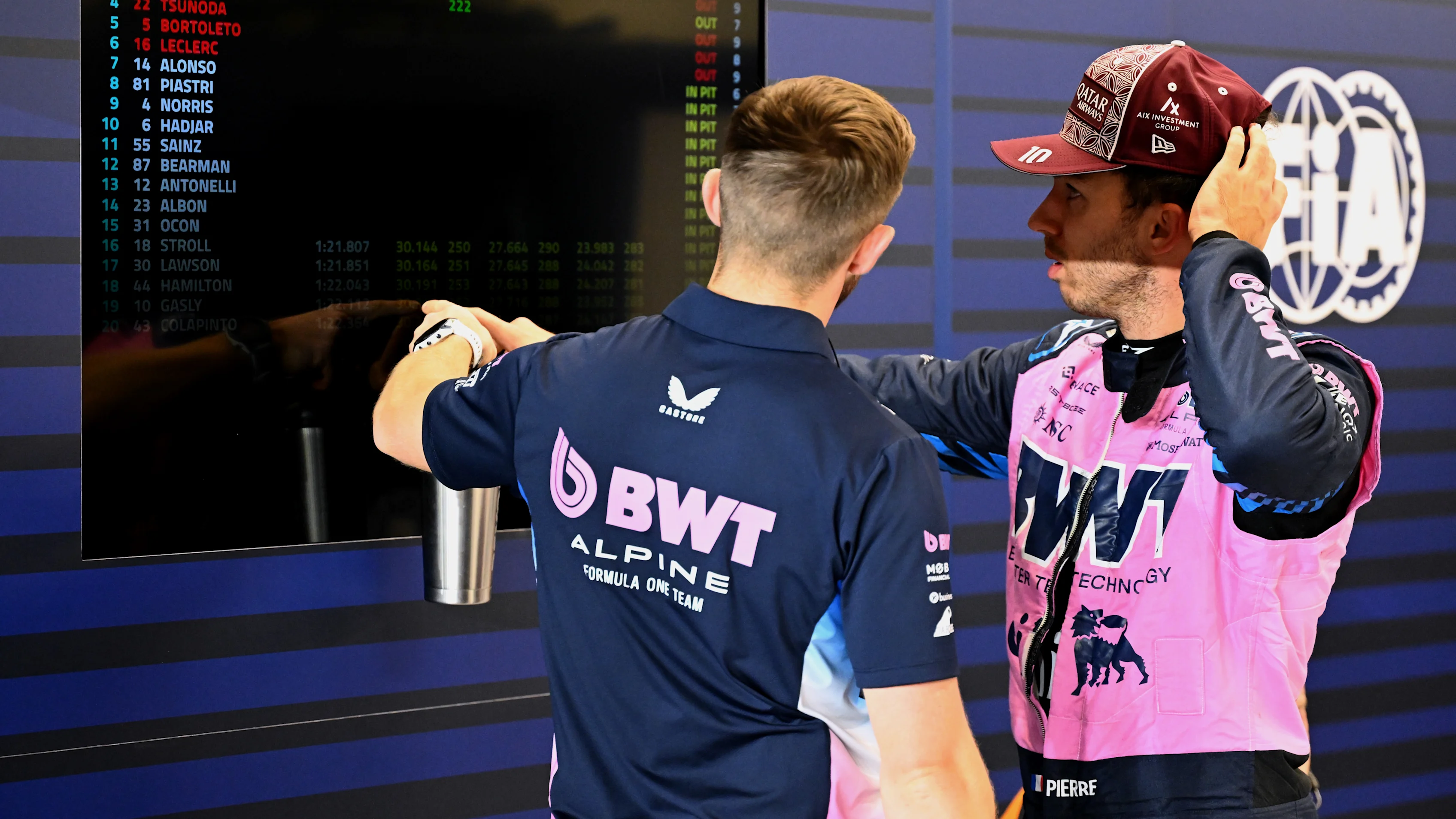 LUSAIL CITY, QATAR - NOVEMBER 28: Pierre Gasly of France and Alpine F1 checks the timing sheet during Sprint Qualifying ahead of the F1 Grand Prix of Qatar at Lusail International Circuit on November 28, 2025 in Lusail City, Qatar. (Photo by Mark Sutton - Formula 1/Formula 1 via Getty Images)