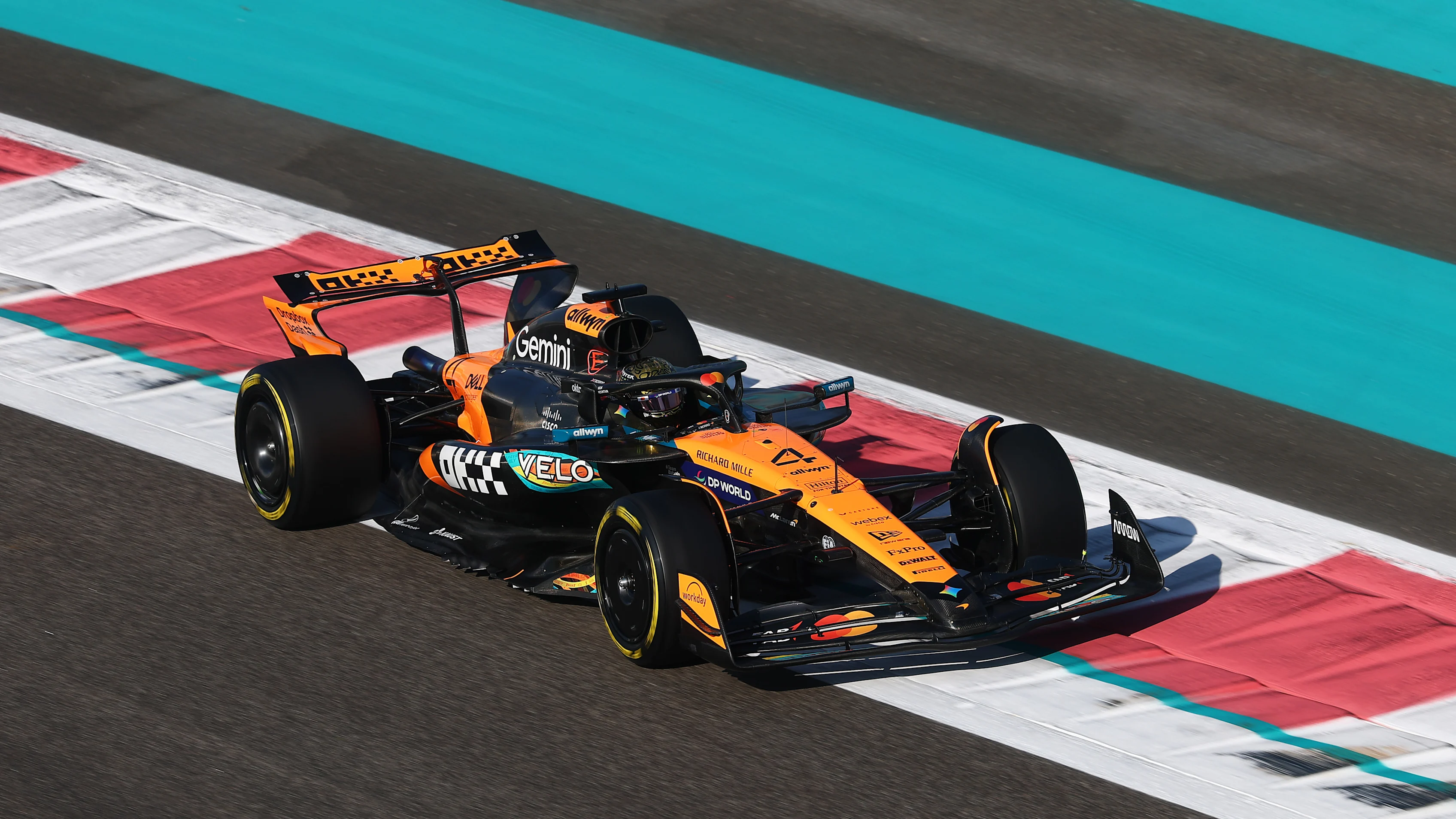 ABU DHABI, UNITED ARAB EMIRATES - DECEMBER 09: Lando Norris of Great Britain driving the (4)