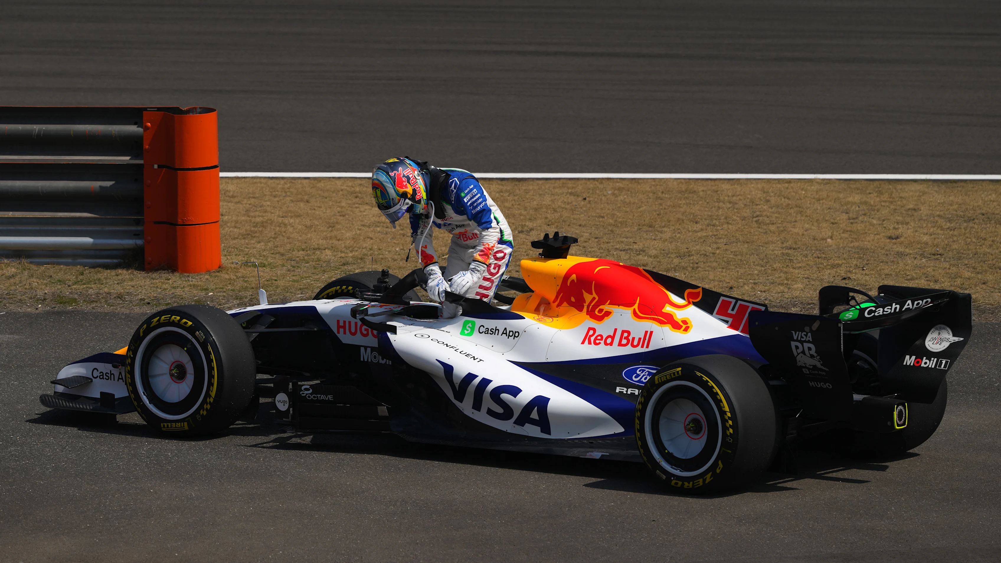 SHANGHAI, CHINA - MARCH 13: Arvid Lindblad of Great Britain and Visa Cash App Racing Bulls climbs