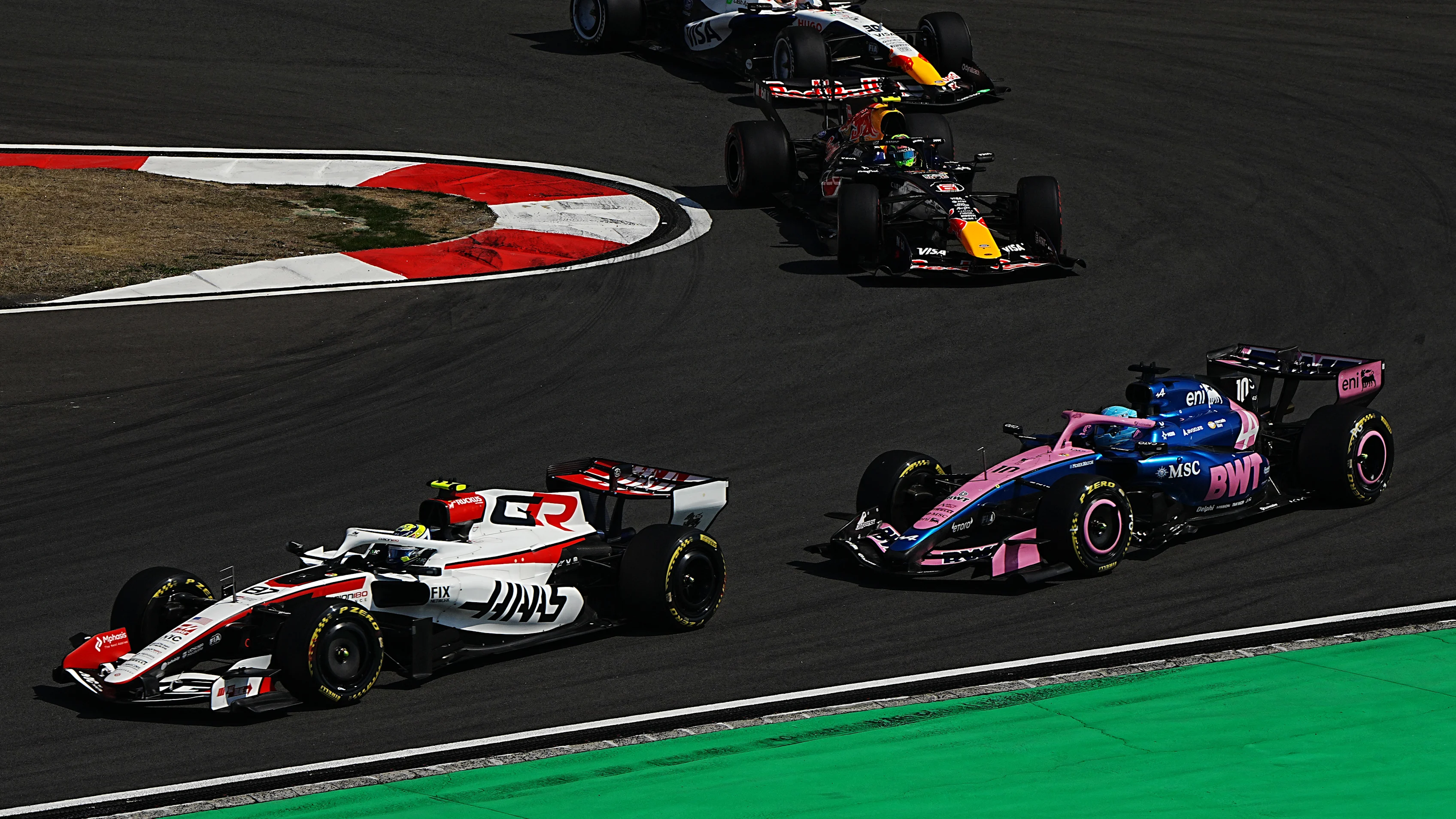 SHANGHAI, CHINA - MARCH 14: Oliver Bearman of Great Britain driving the (87) Haas F1 VF-26 Ferrari leads Pierre Gasly of France and Alpine F1 Team, Isack Hadjar of France driving the (6) Oracle Red Bull Racing RB22 Red Bull Ford and Liam Lawson of New Zealand driving the (30) Visa Cash App Racing Bulls VCARB 03 RB Ford during the Sprint race ahead of the F1 Grand Prix of China at Shanghai International Circuit on March 14, 2026 in Shanghai, China. (Photo by Alex Bierens de Haan/Getty Images)