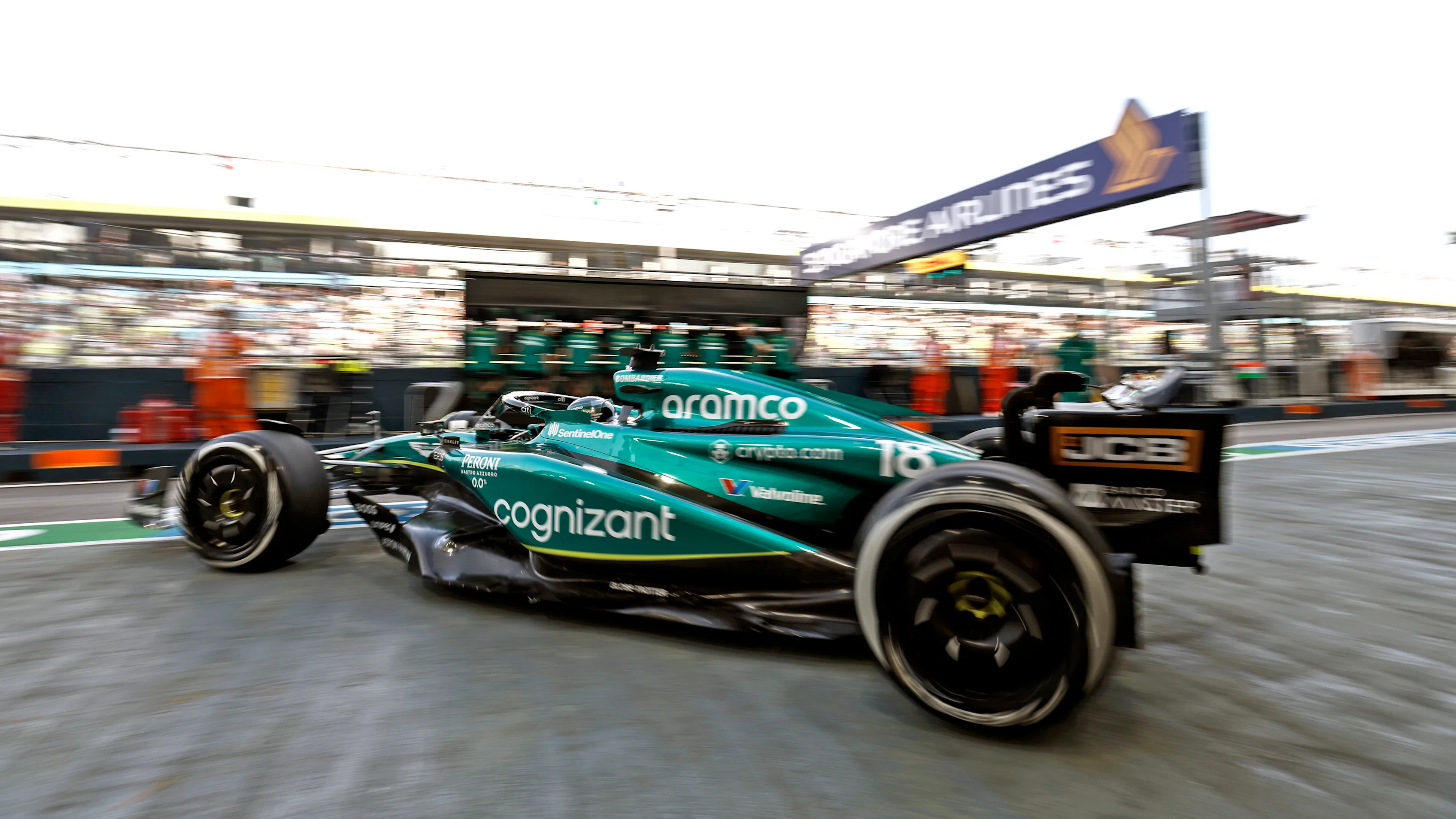 MARINA BAY STREET CIRCUIT, SINGAPORE - SEPTEMBER 15: Lance Stroll, Aston Martin AMR23, leaves the
