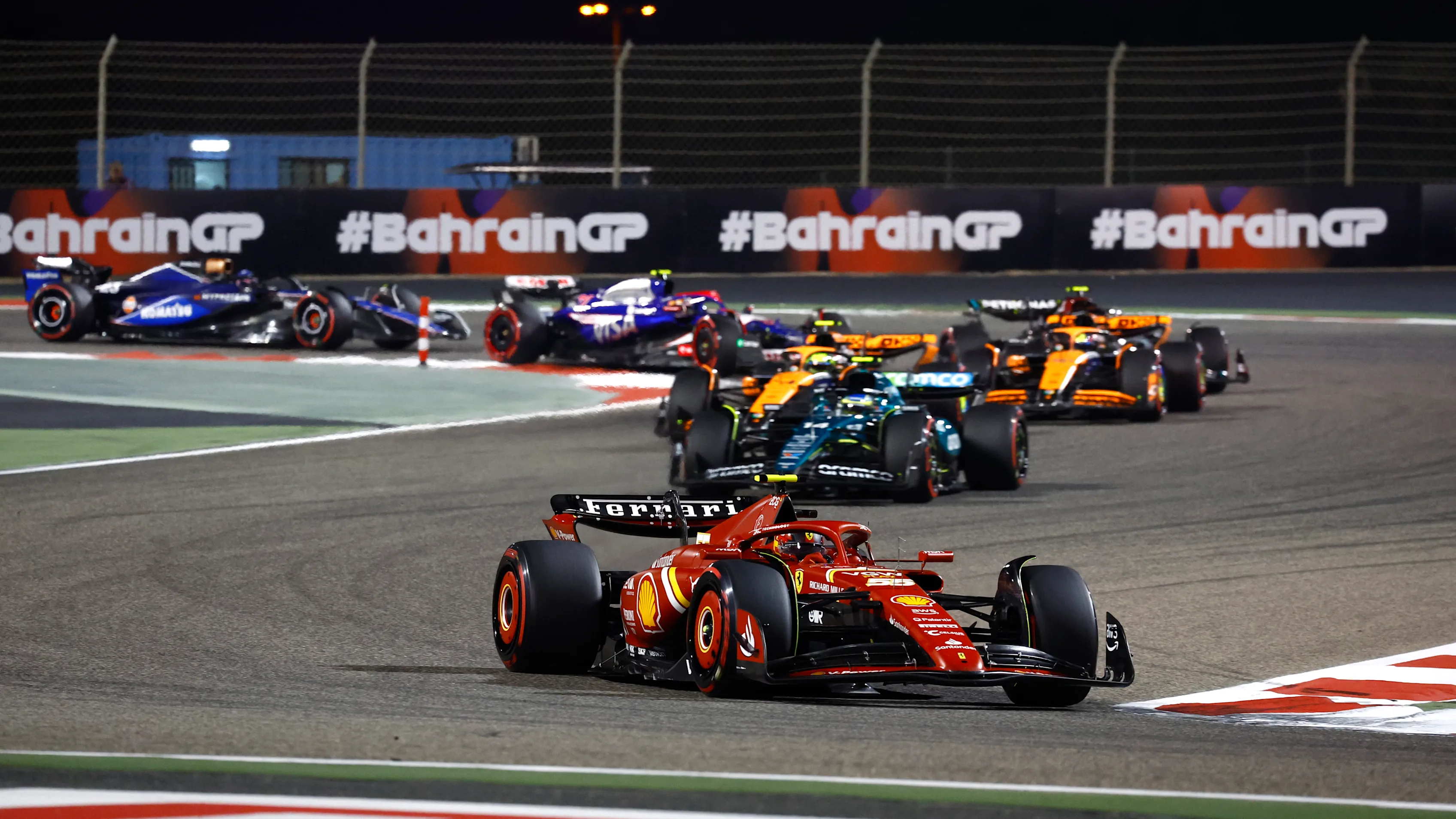 BAHRAIN INTERNATIONAL CIRCUIT, BAHRAIN - MARCH 02: Carlos Sainz, Ferrari SF-24, leads Fernando