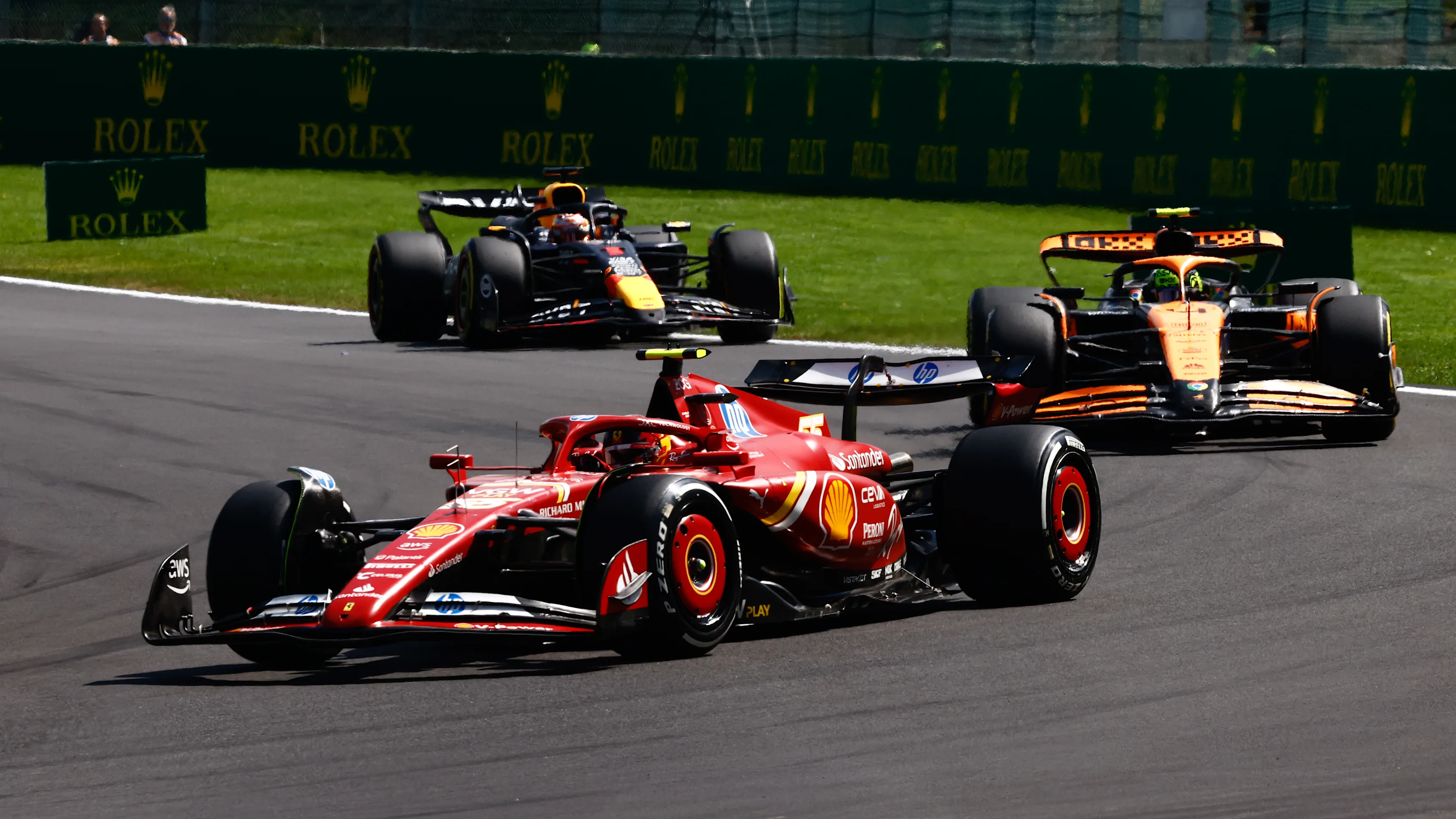 Carlos Sainz of Ferrari, Lando Norris of McLaren and Max Verstappen of Red Bull Racing during the