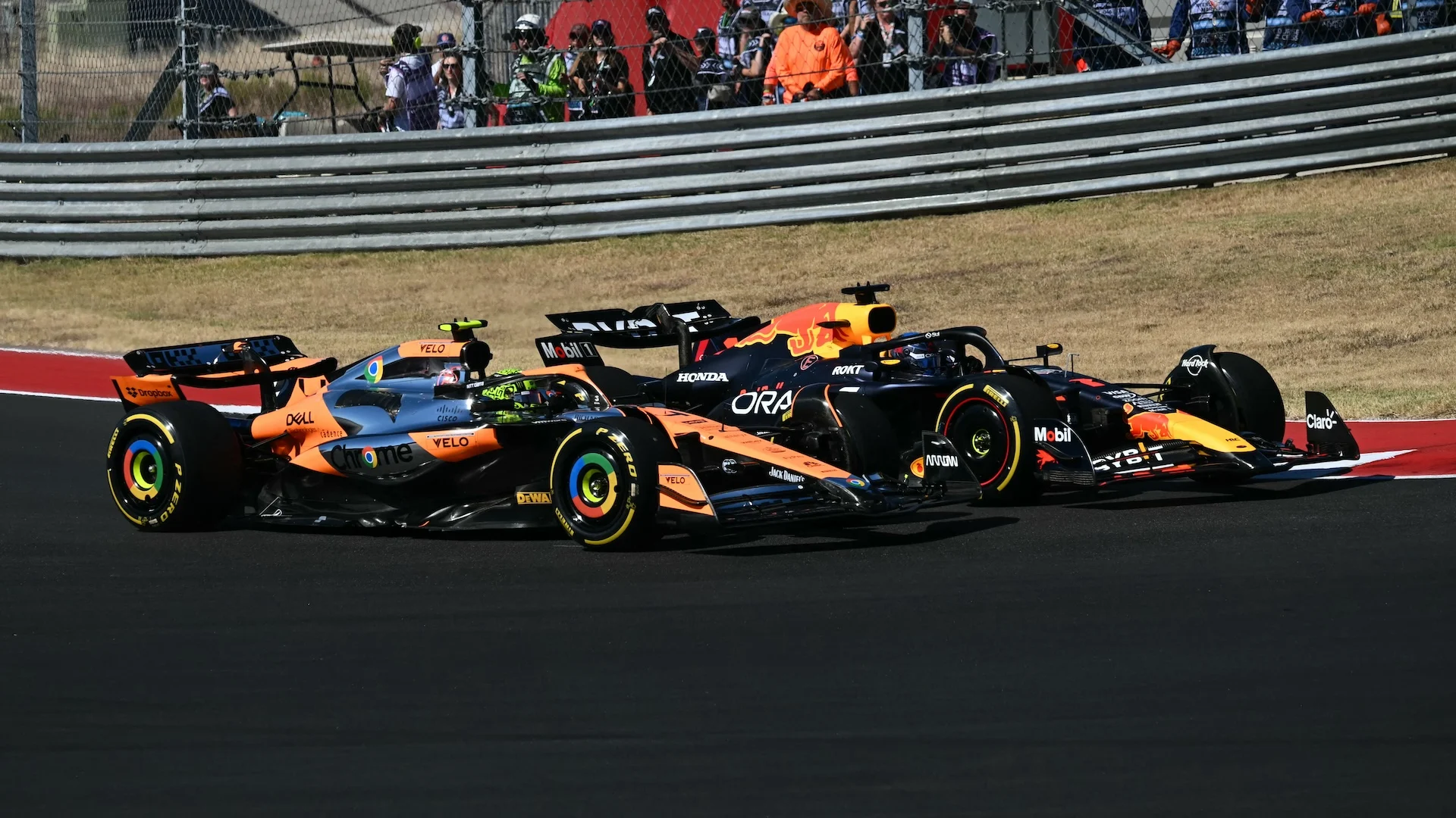Red Bull Racing's Dutch driver Max Verstappen races ahead of McLaren's British driver Lando Norris
