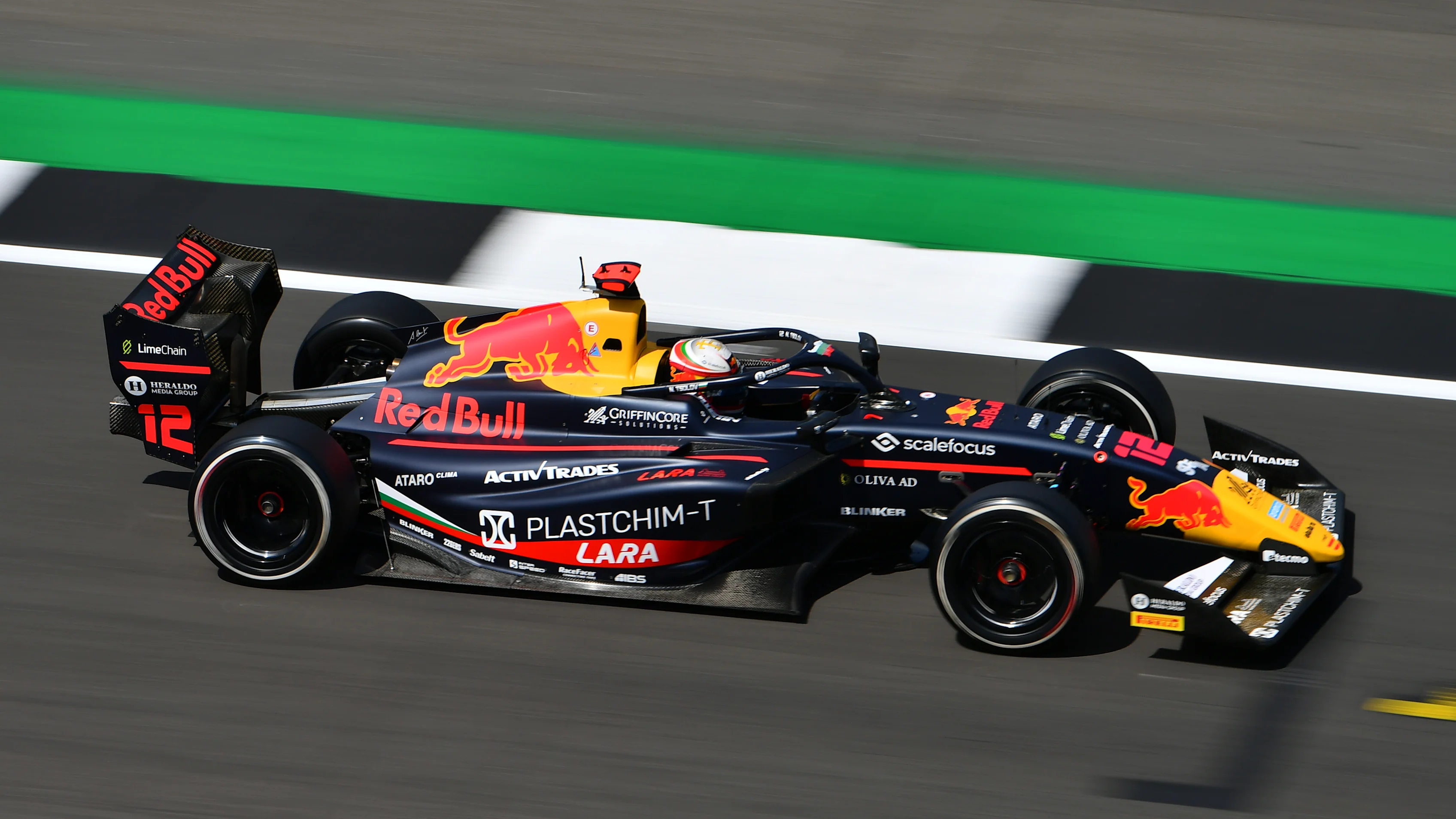 NORTHAMPTON, ENGLAND - JULY 04: Nikola Tsolov of Bulgaria and Campos Racing (12) on track during