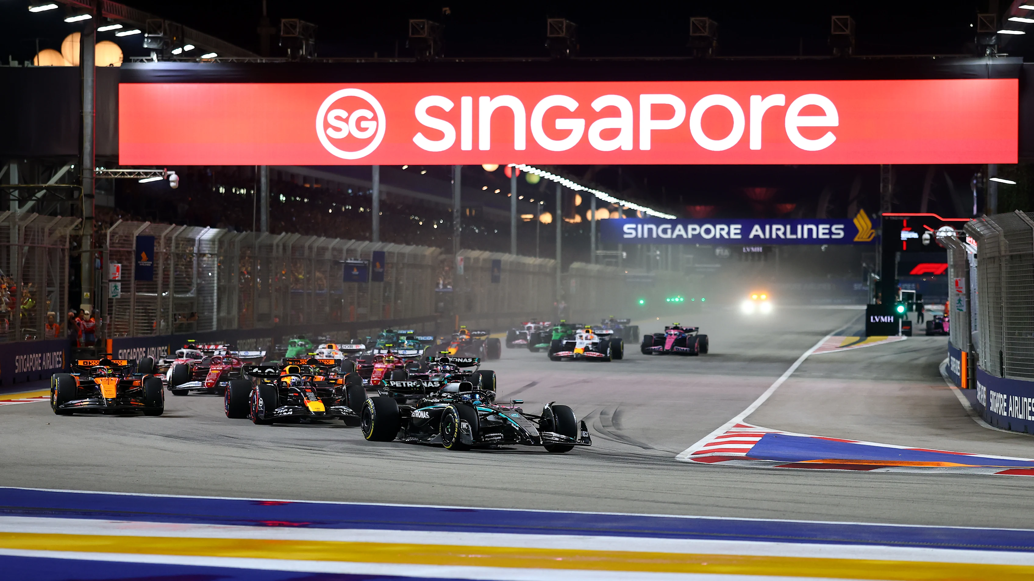 SINGAPORE, SINGAPORE - OCTOBER 05: George Russell of Great Britain driving the (63) Mercedes AMG