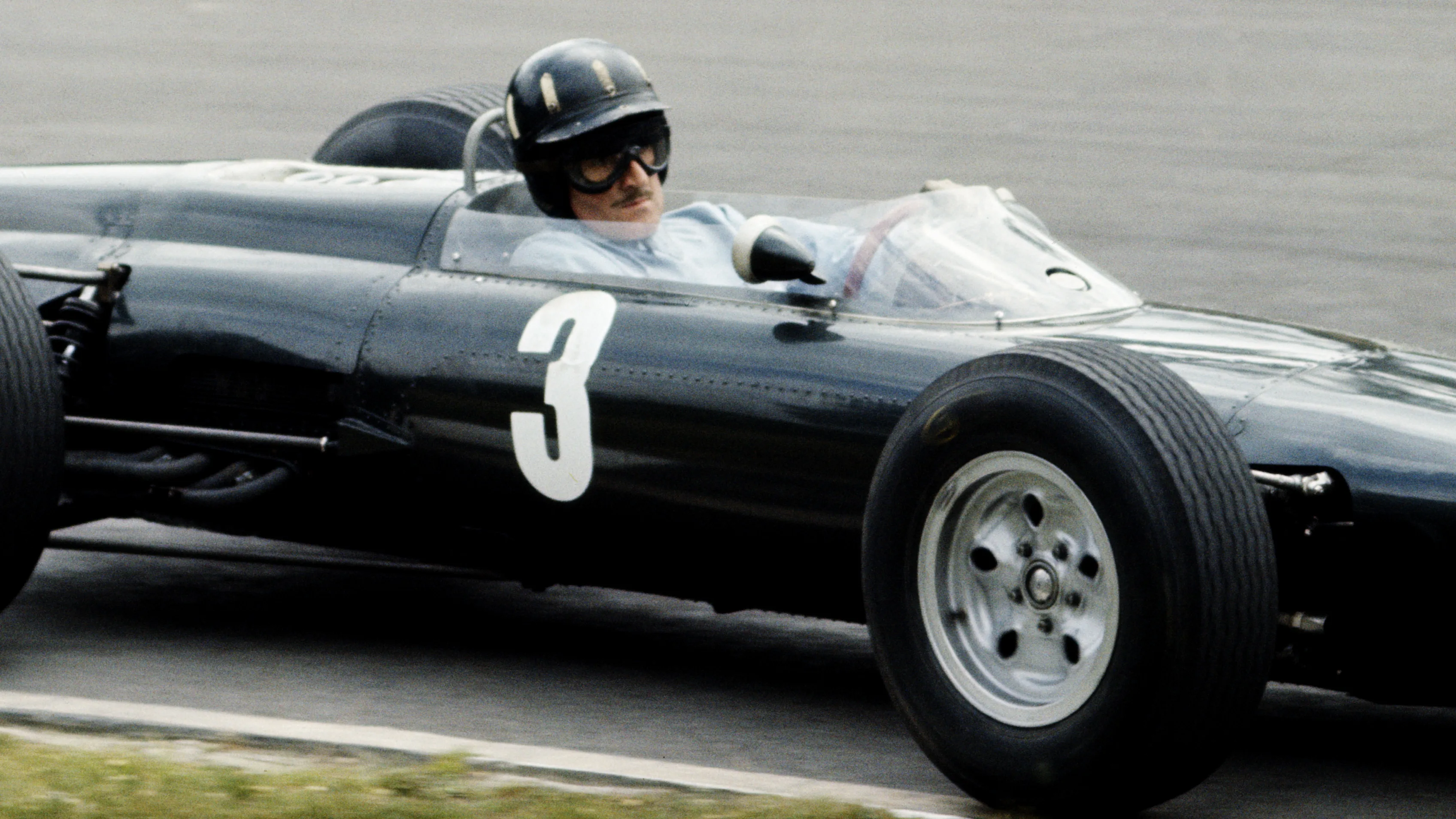 Graham Hill drives the #3 Owen Racing OrganisationBRM P261 BRM 1.5 V8 during the British Grand Prix