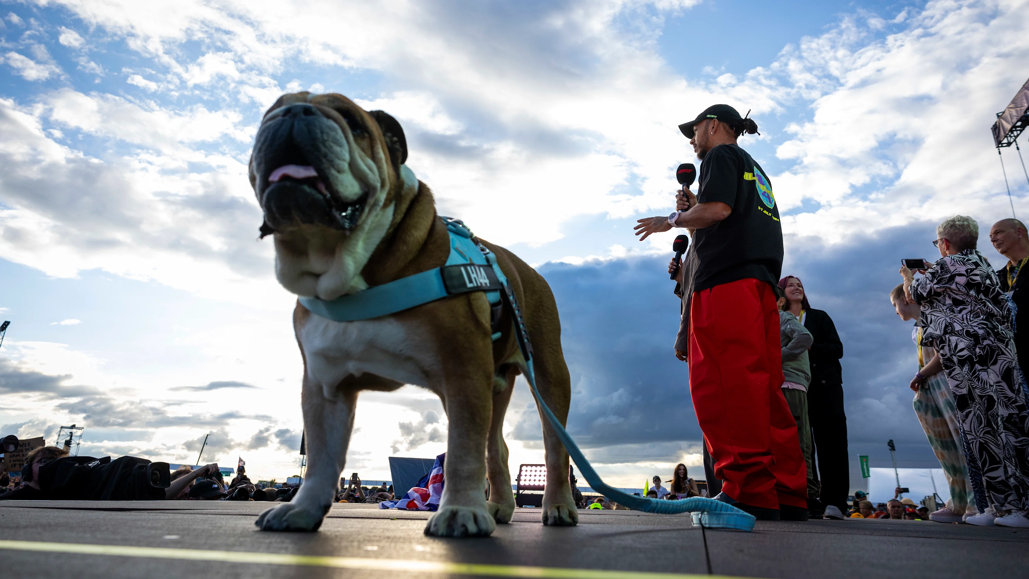 NORTHAMPTON, ENGLAND - JULY 07: Sir Lewis Hamilton, Mercedes-AMG F1 Team, on stage with Roscoe the