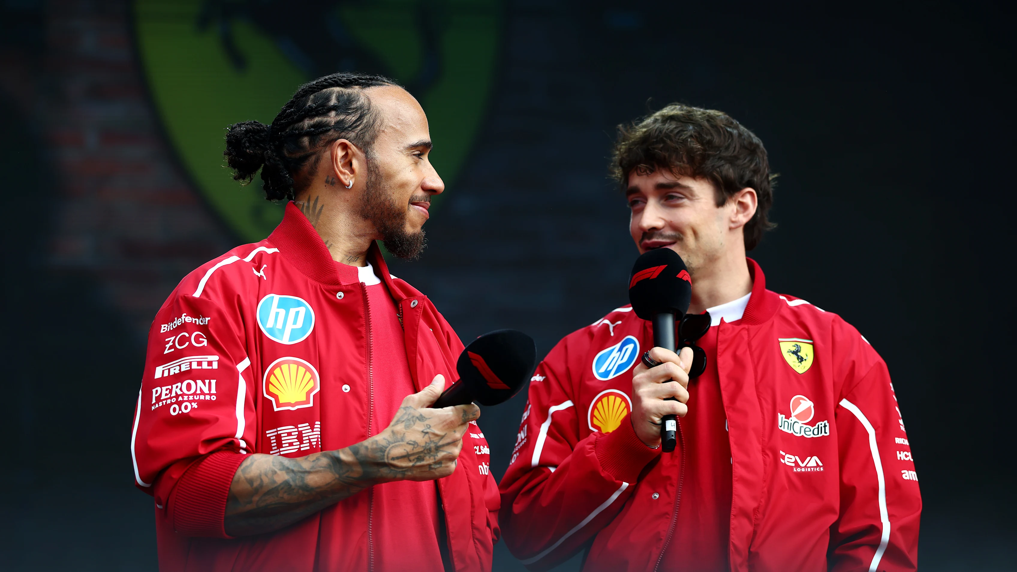 MELBOURNE, AUSTRALIA - MARCH 15: Lewis Hamilton of Great Britain and Scuderia Ferrari and Charles