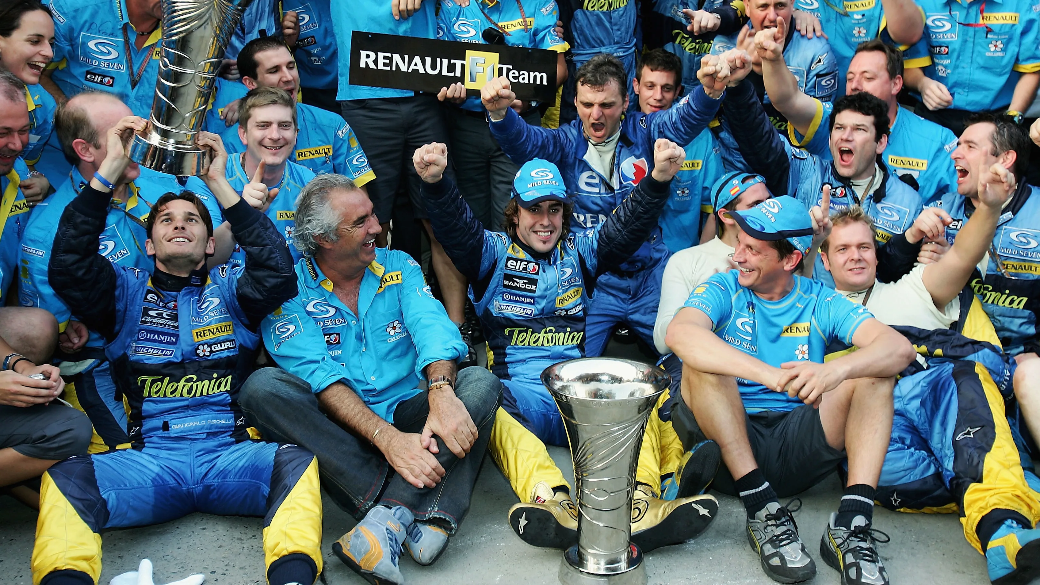 SHANGHAI, CHINA - OCTOBER 16:  Fernando Alonso of Spain and Renault celebrates with Team principal