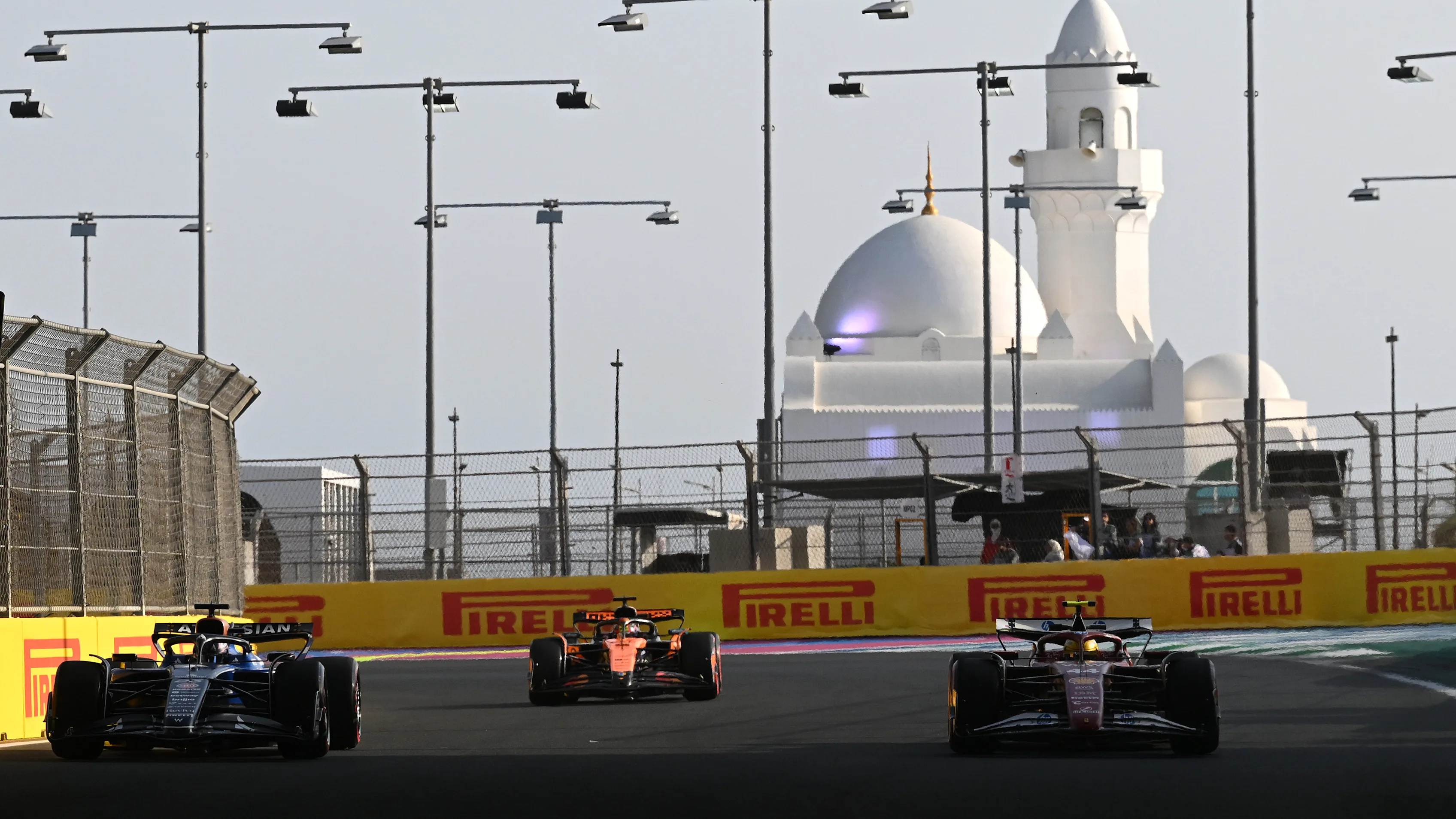 JEDDAH, SAUDI ARABIA - APRIL 17: Lewis Hamilton of Great Britain and Scuderia Ferrari talks with a