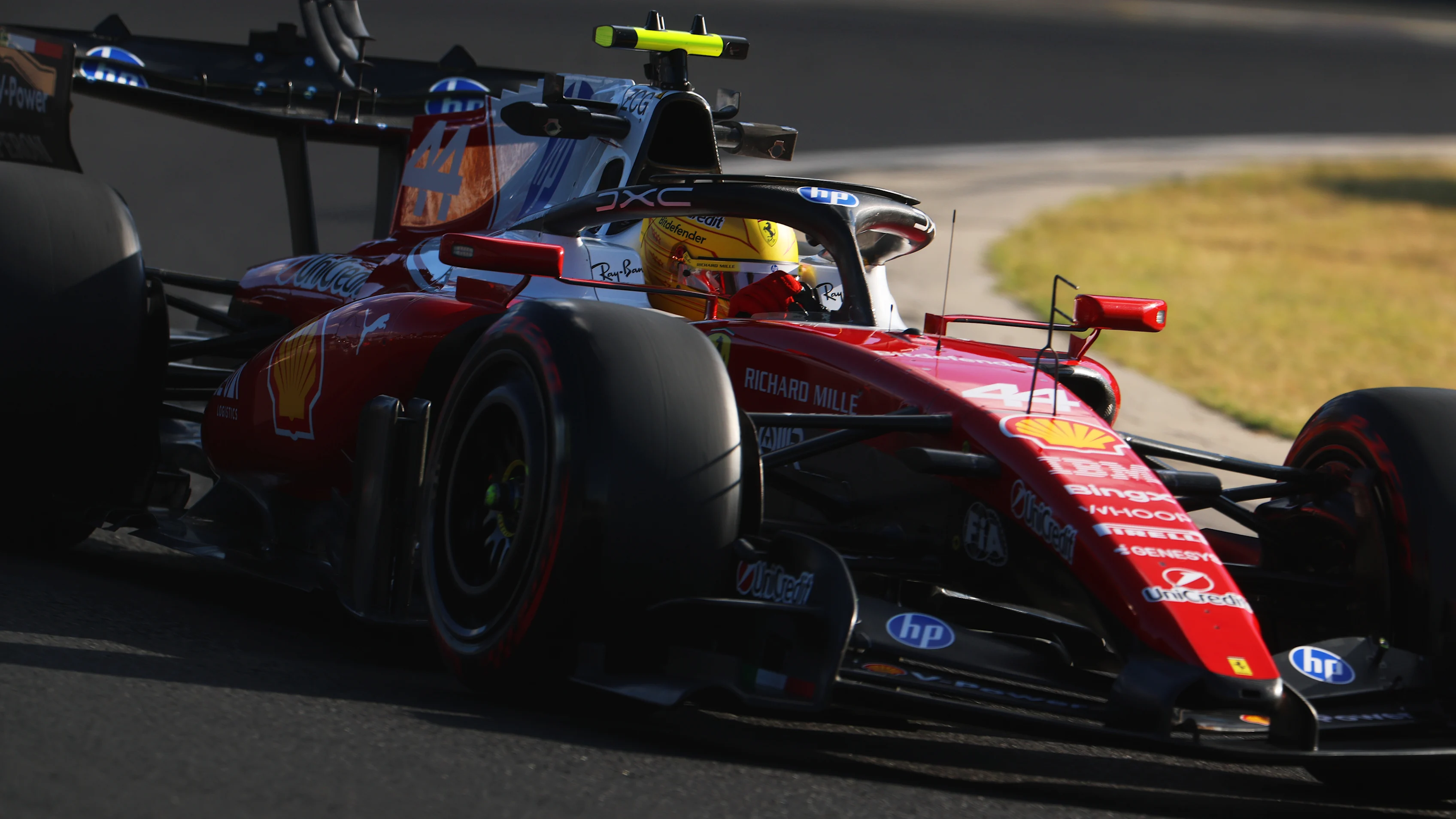 BUDAPEST, HUNGARY - JULY 24: Lewis Hamilton of Great Britain driving the (44) Scuderia Ferrari
