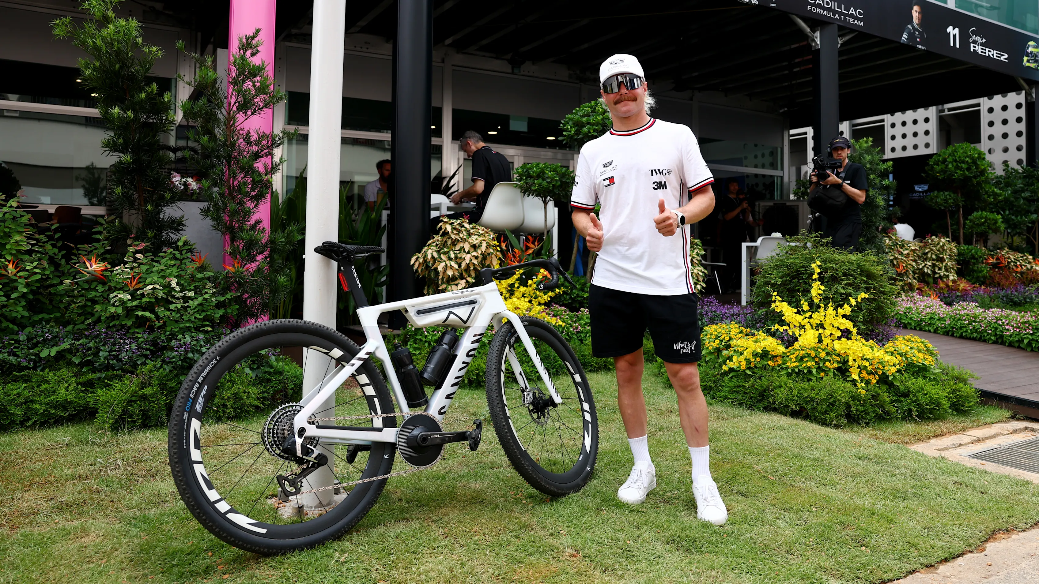 SINGAPORE, SINGAPORE - OCTOBER 08: Valtteri Bottas of Finland and Cadillac F1 Team poses for a