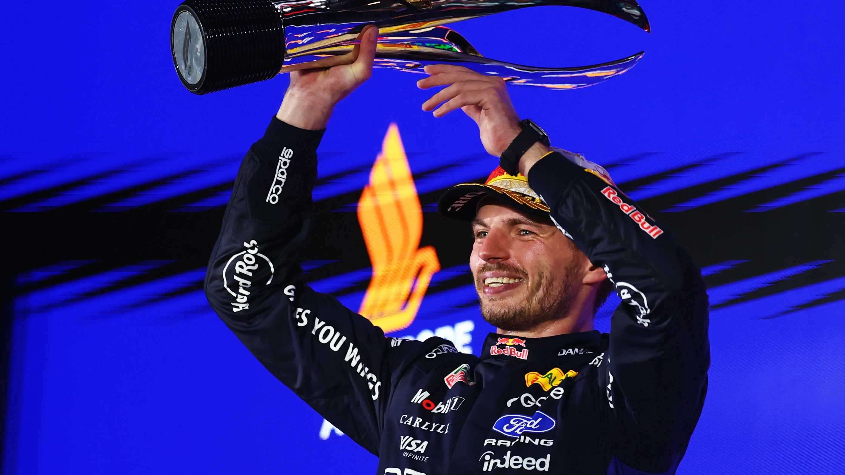 SINGAPORE, SINGAPORE - OCTOBER 11: Race winner Max Verstappen of the Netherlands and Oracle Red