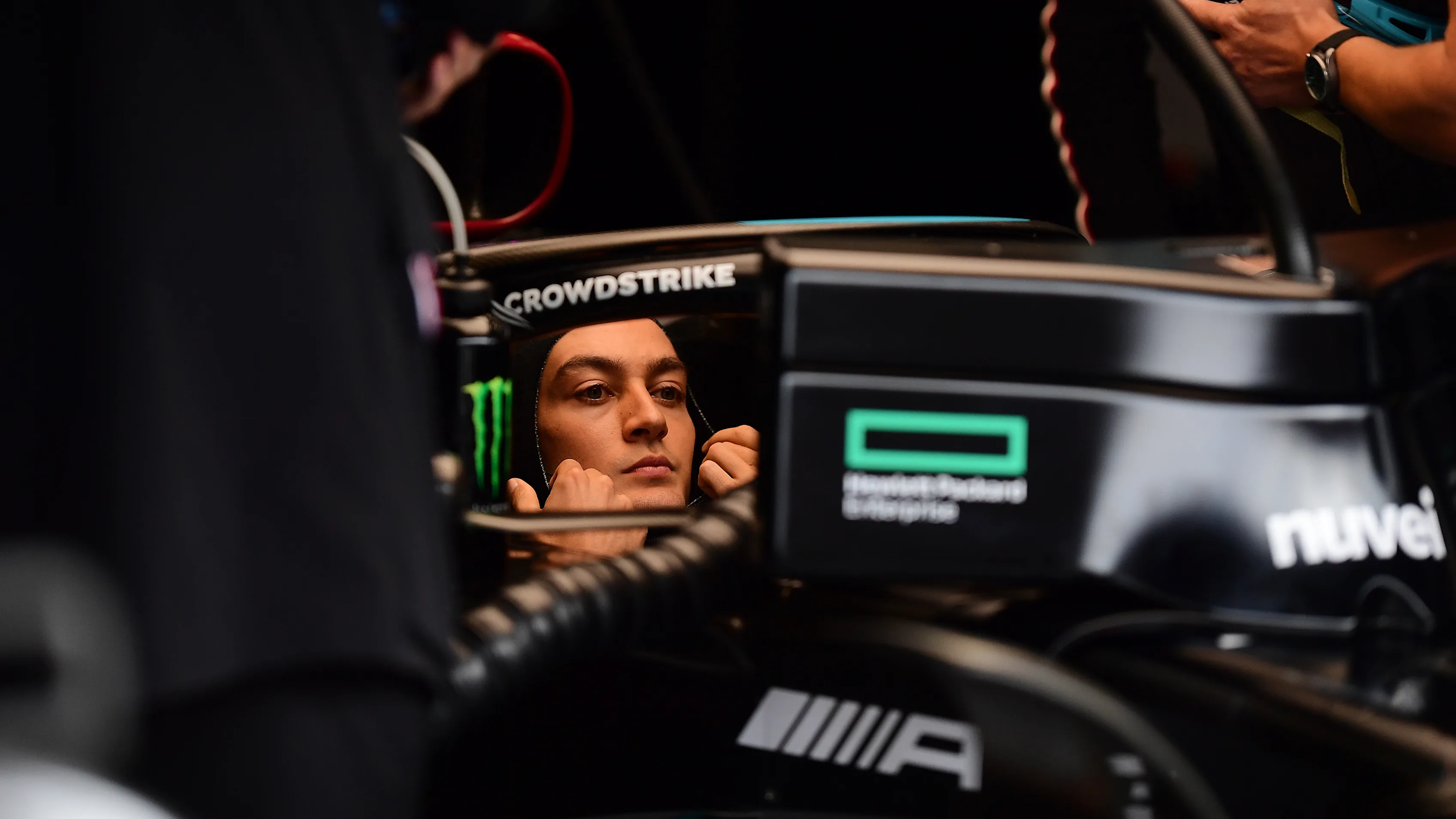 SPA, BELGIUM - JULY 30: Lewis Hamilton of Great Britain and Mercedes prepares to drive on the grid